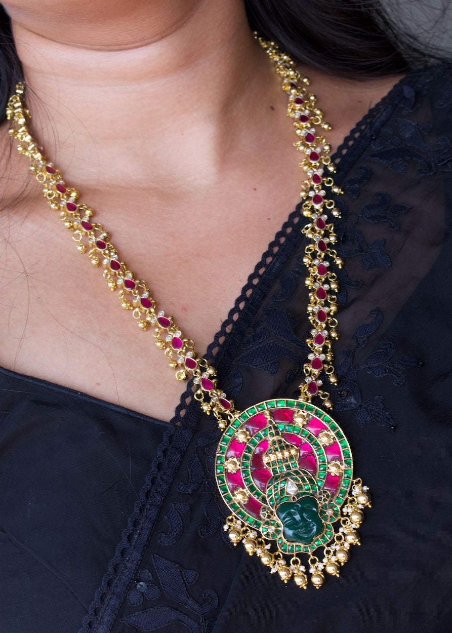 Kathakali-inspired temple necklace with vibrant kundan stones and pachi enamel detailing