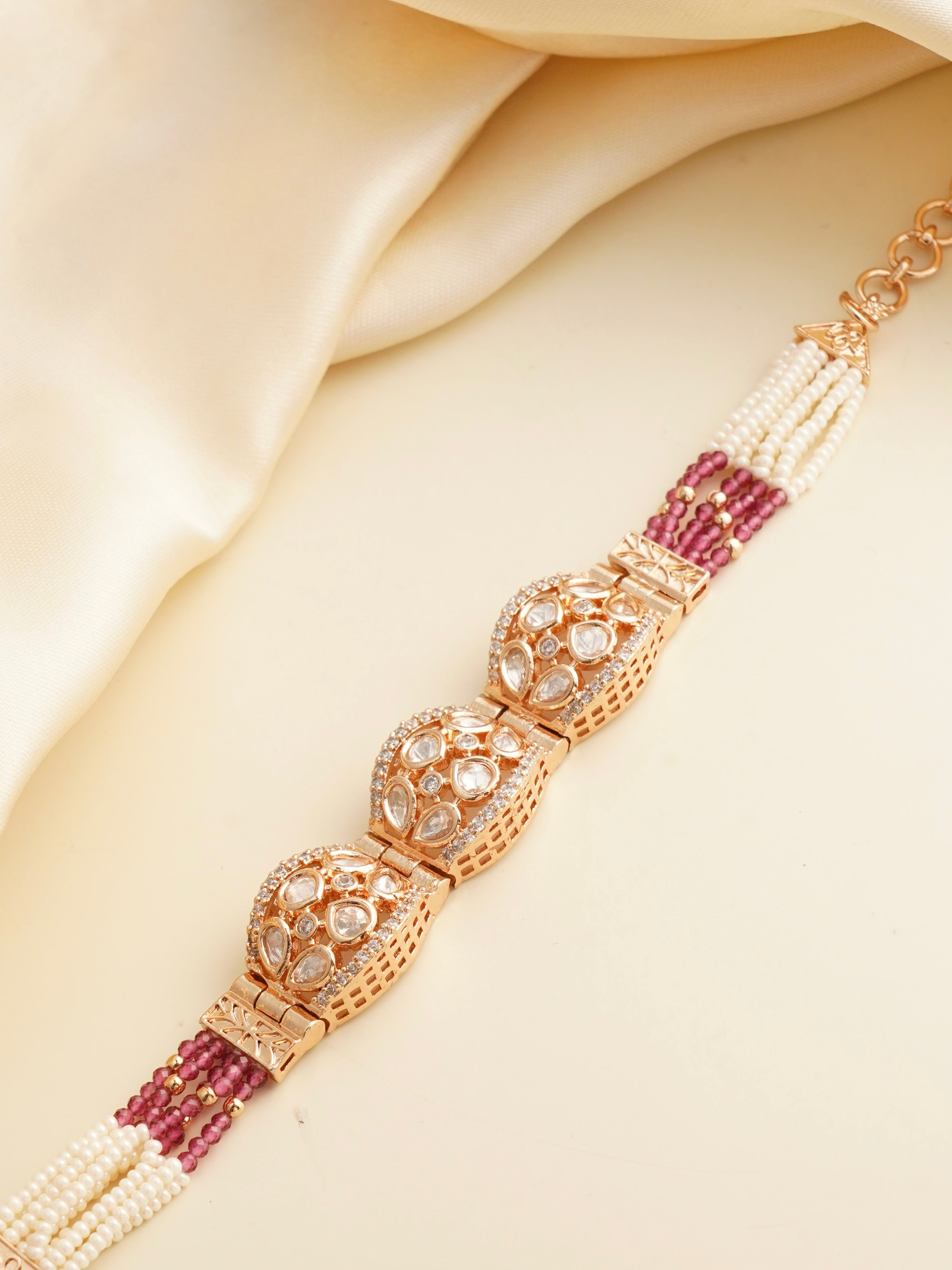 Polki dome bracelet with uncut stones, pearl rows and ruby pink bead strands