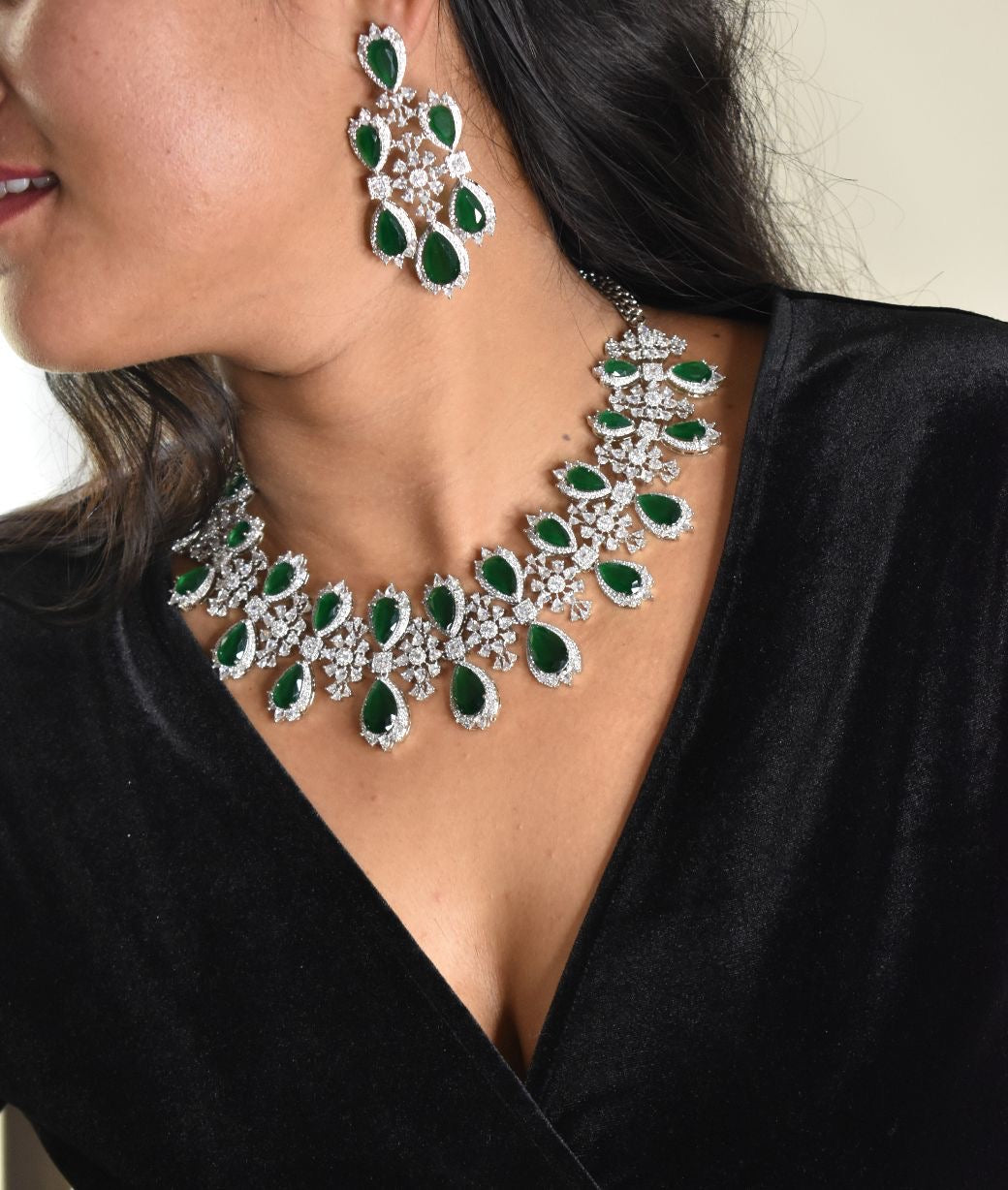 Ruby teardrop necklace set with floral detailing, Manish Malhotra-inspired luxury design