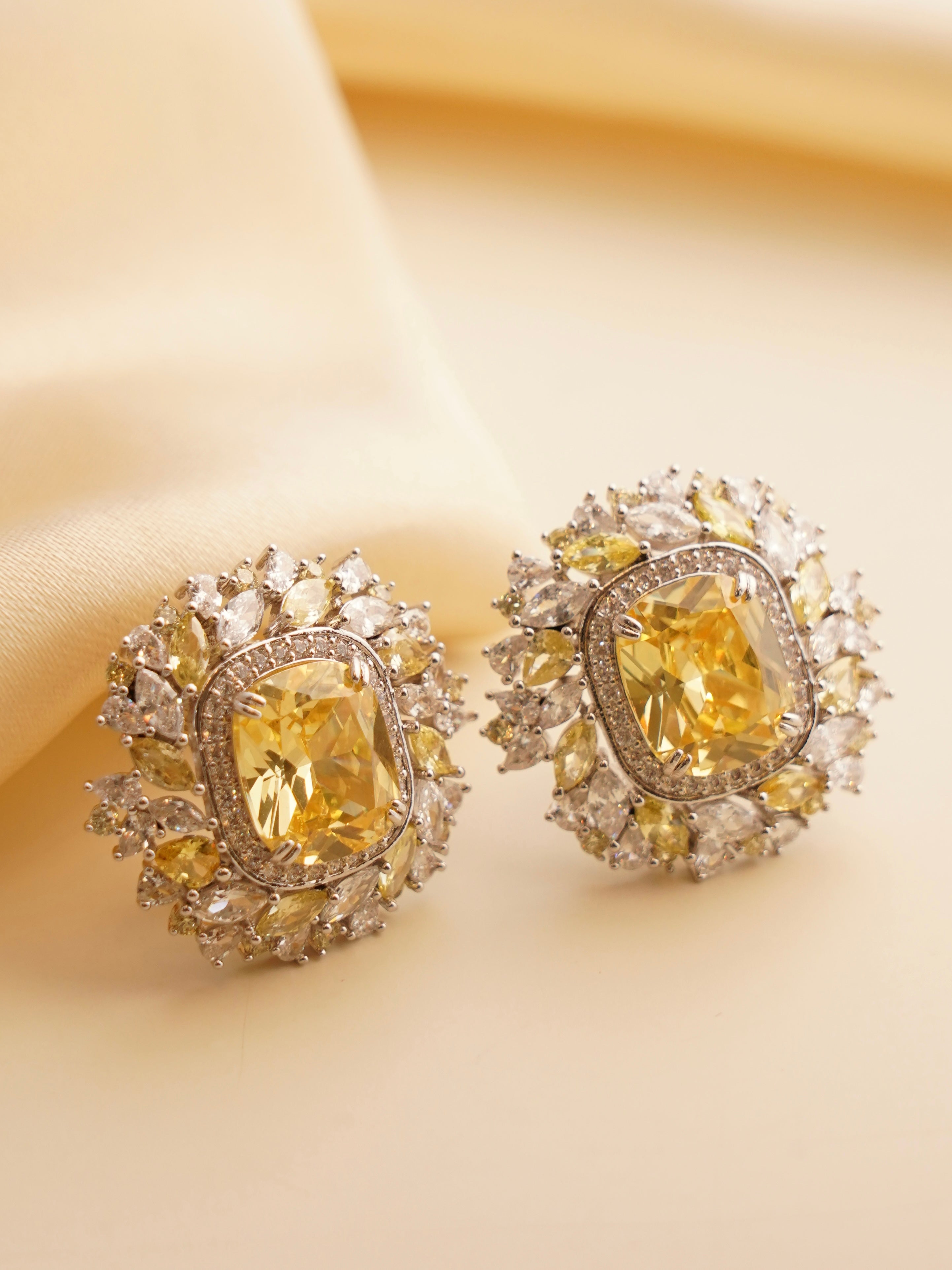 Classic black Swarovski studs featuring halo setting and royal-inspired crystal detailing