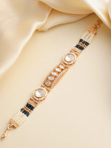 Bracelet clasp detail highlighting adjustable fit and gold-toned finish