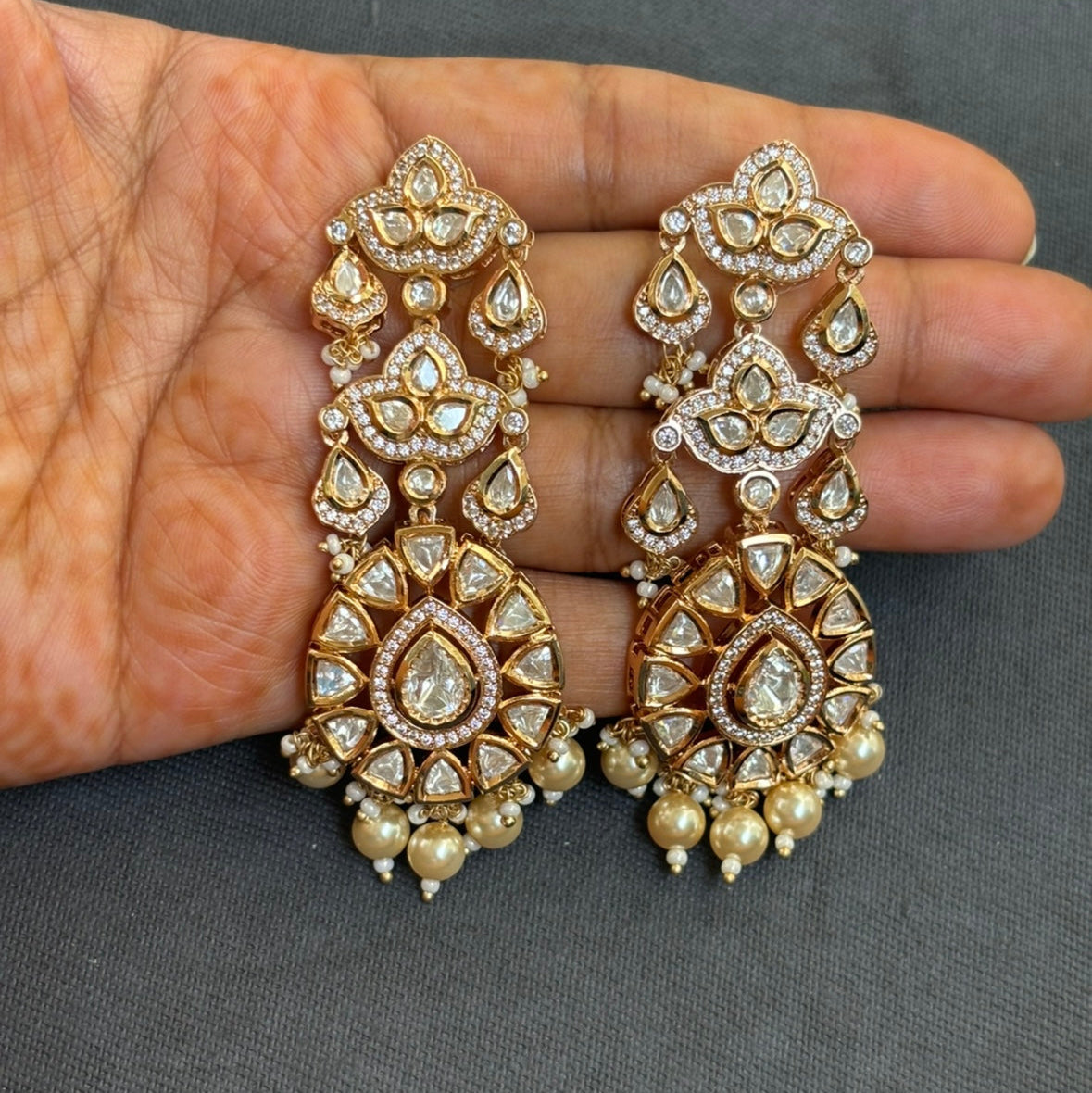 Side angle of elena earrings with pearls and shimmering embellishments