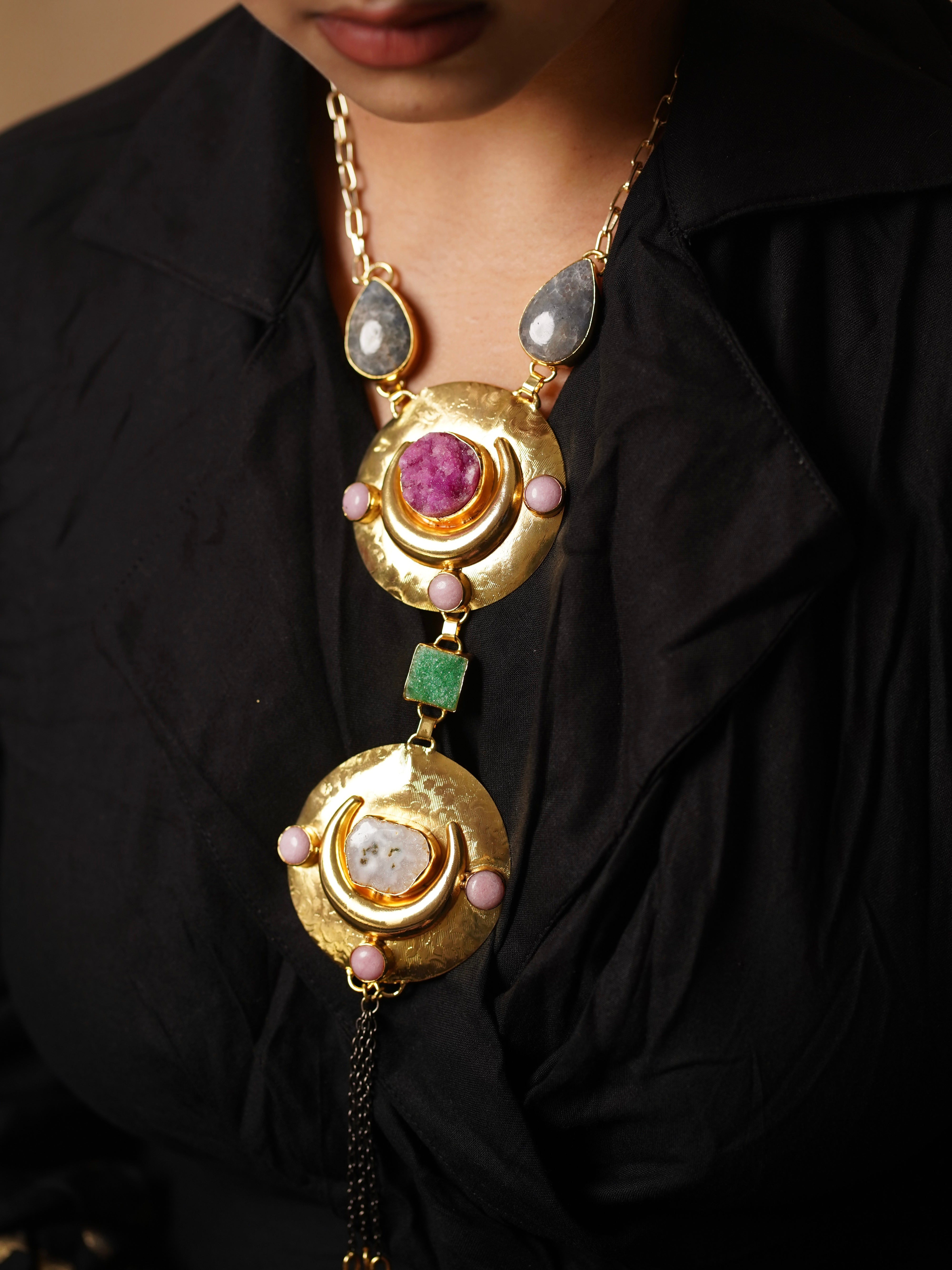 Side view of handcrafted necklace with raw druzy, opal, and labradorite beads in a boho luxe design