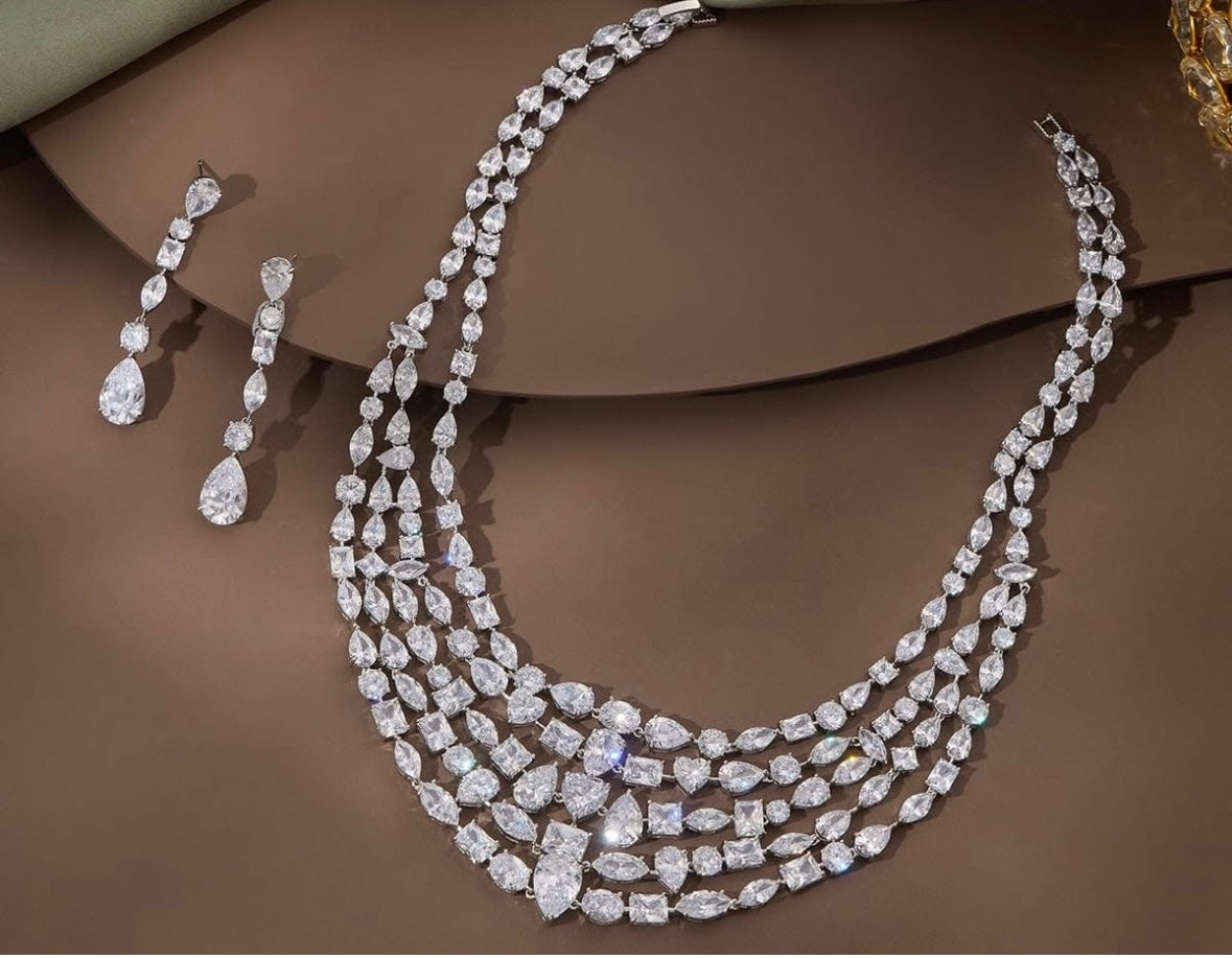 Multi-layered diamond necklace with drop earrings for bridal and formal occasions
