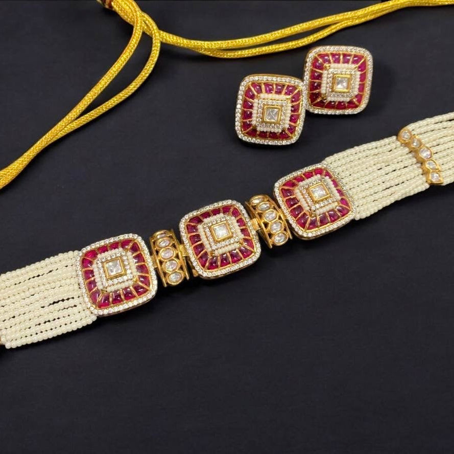 Side angle of choker set with diamond highlights and opaque enamel accents
