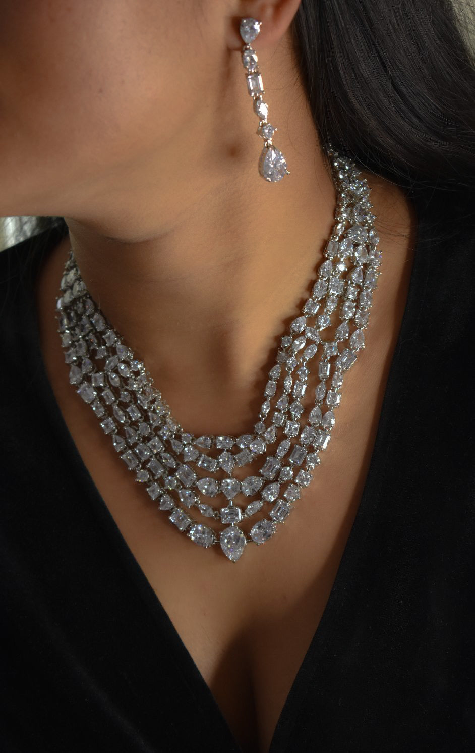 Front view of Victoria Radiance necklace featuring dazzling stones in tiered design