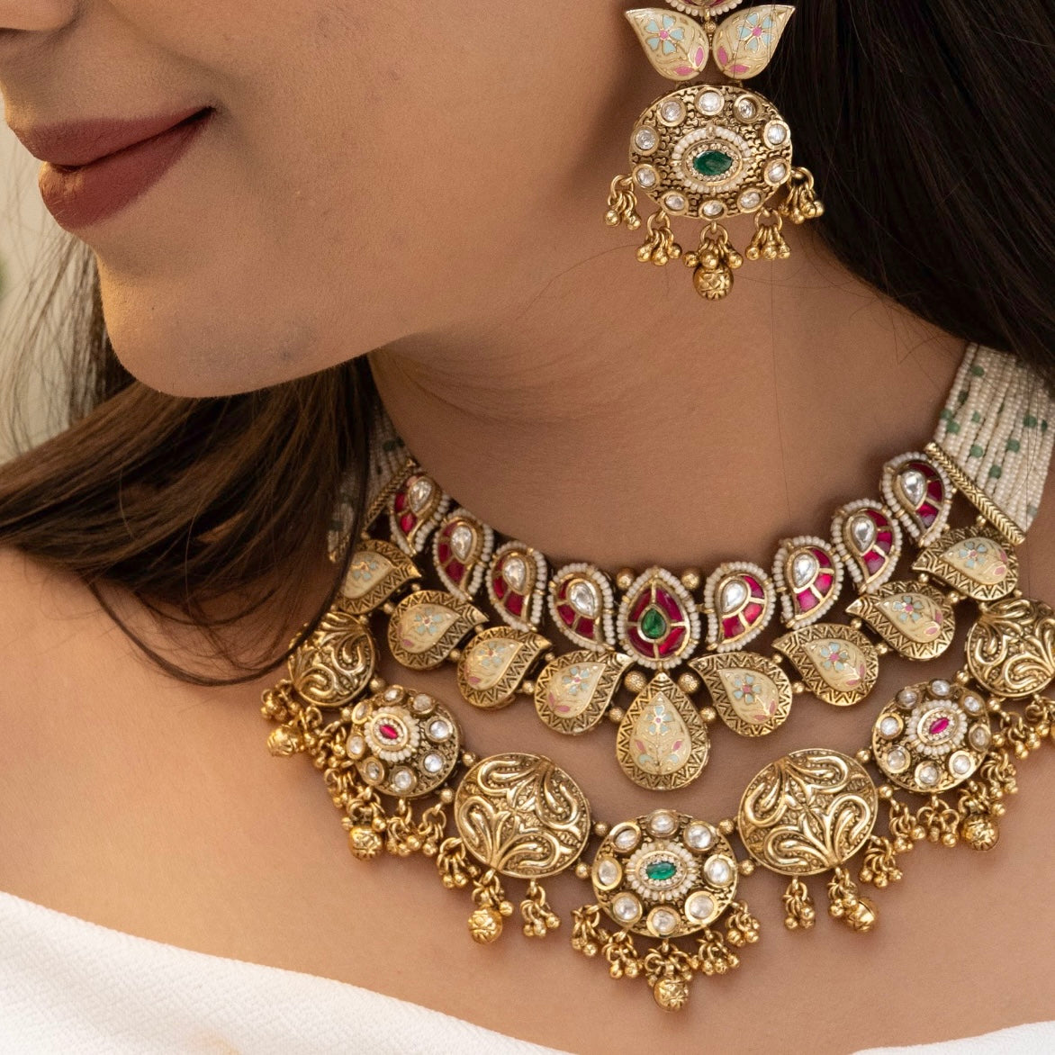 Antique kundan heritage necklace featuring ornate vintage motifs, frontal view