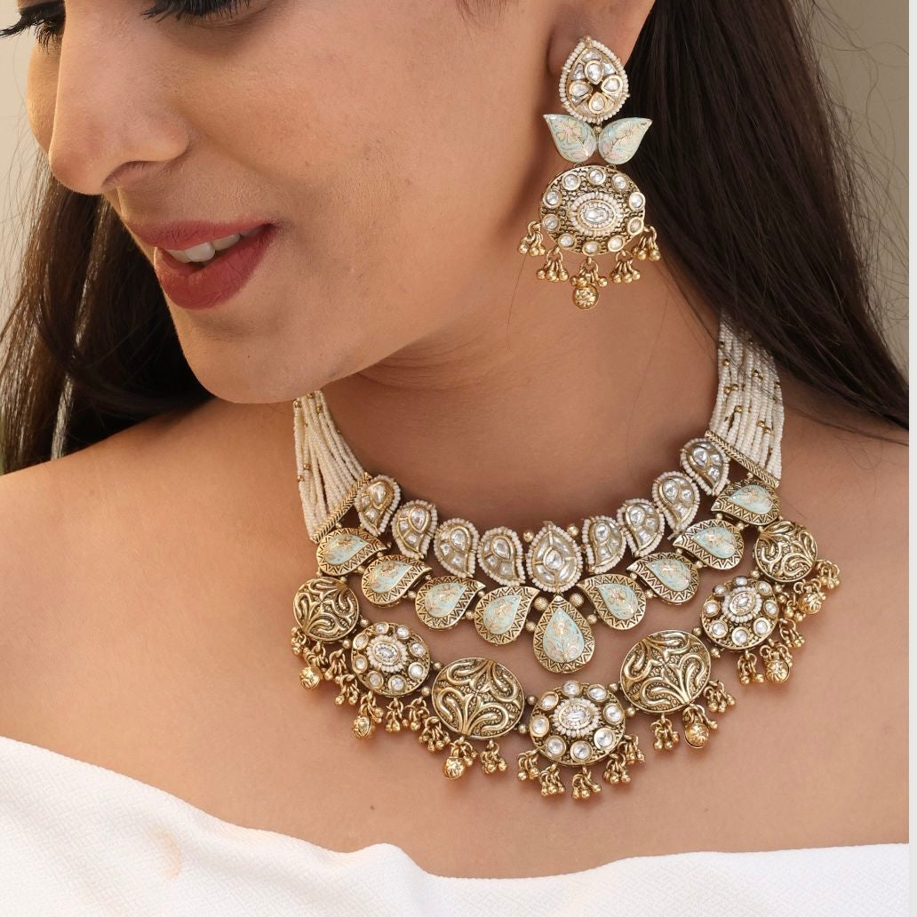 Detailed close-up of heritage necklace highlighting antique kundan work