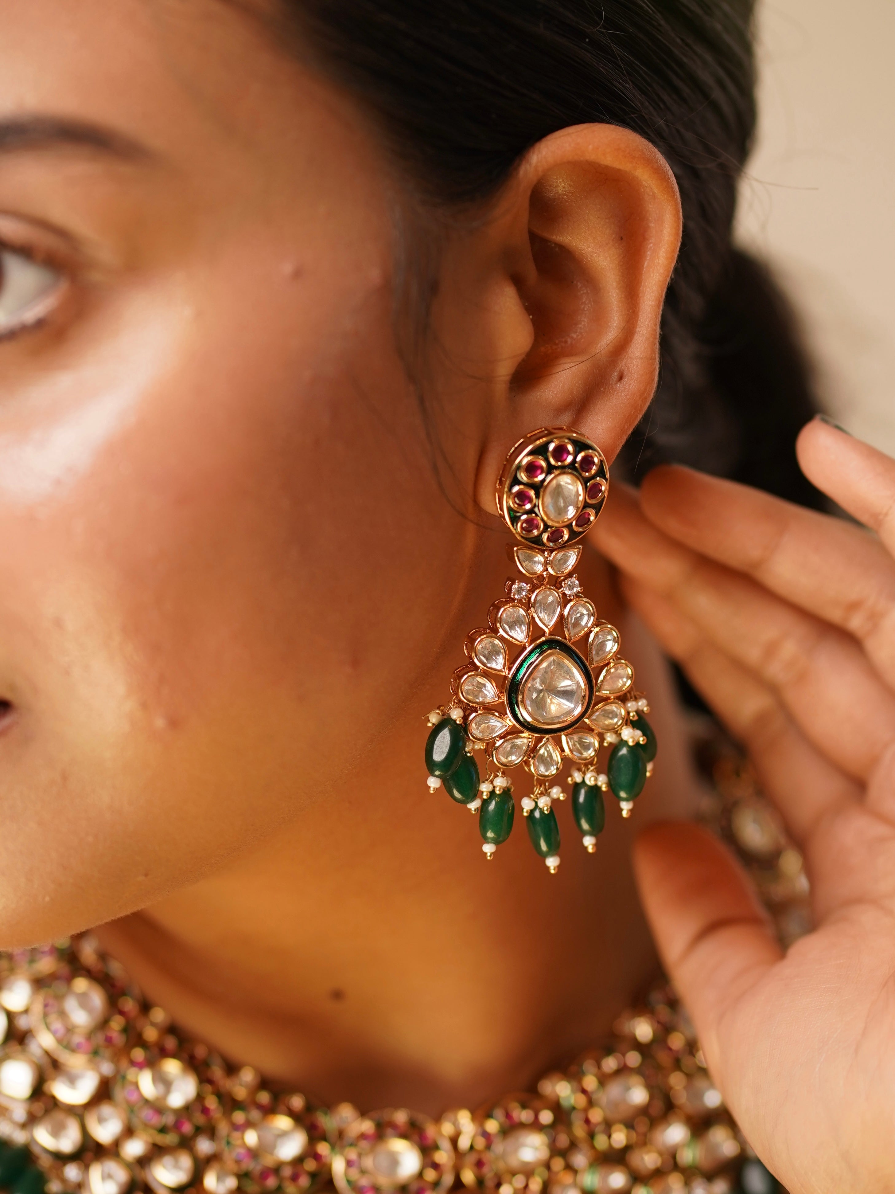 Side image of polki kundan bridal necklace with vibrant meenakari and gem layout