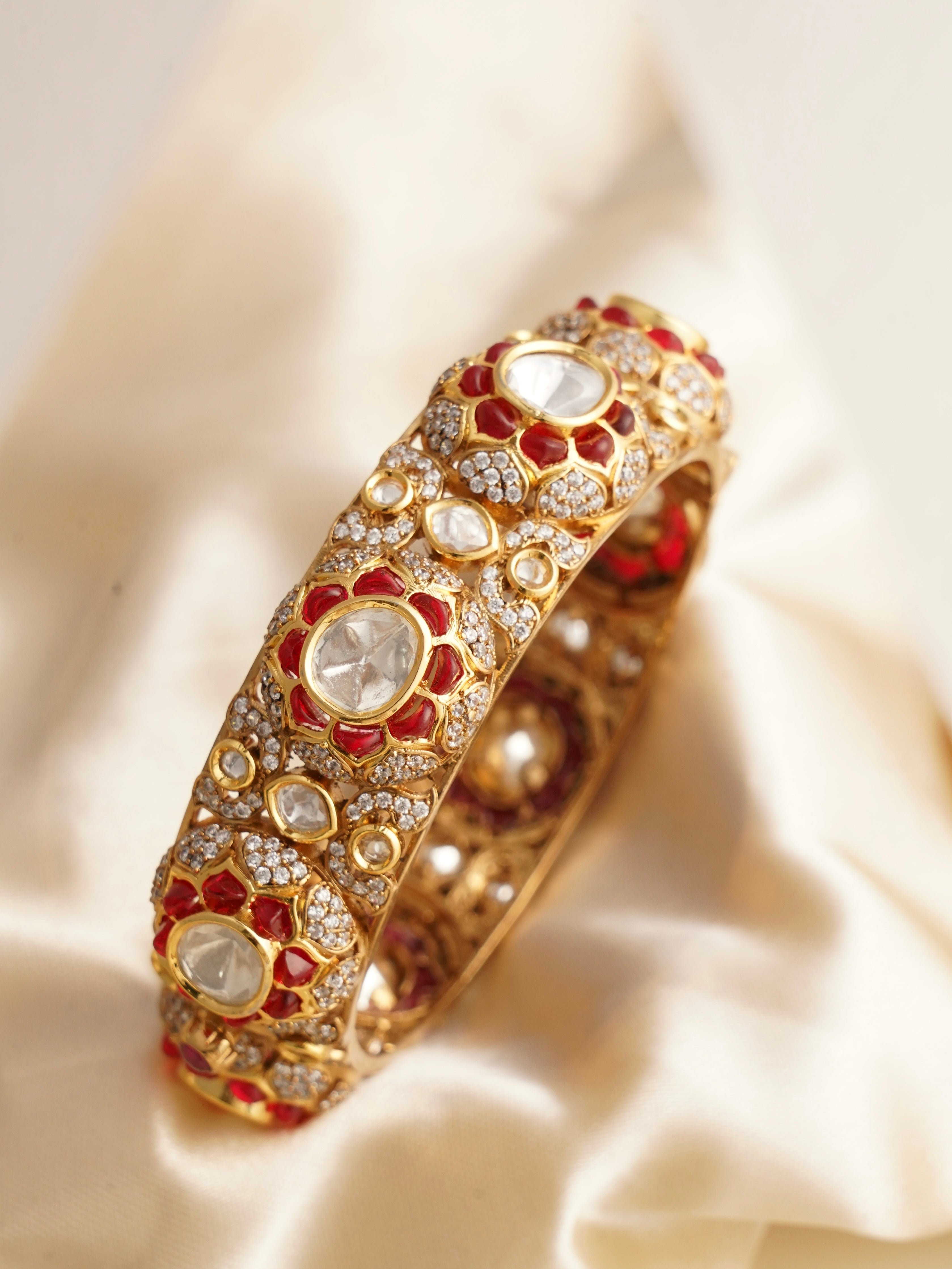 Front view of polki kundan kada with meenakari detailing and floral motifs