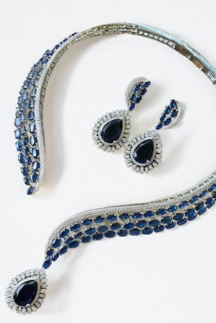 Side profile of exquisite designer necklace with ornate handcrafted elements