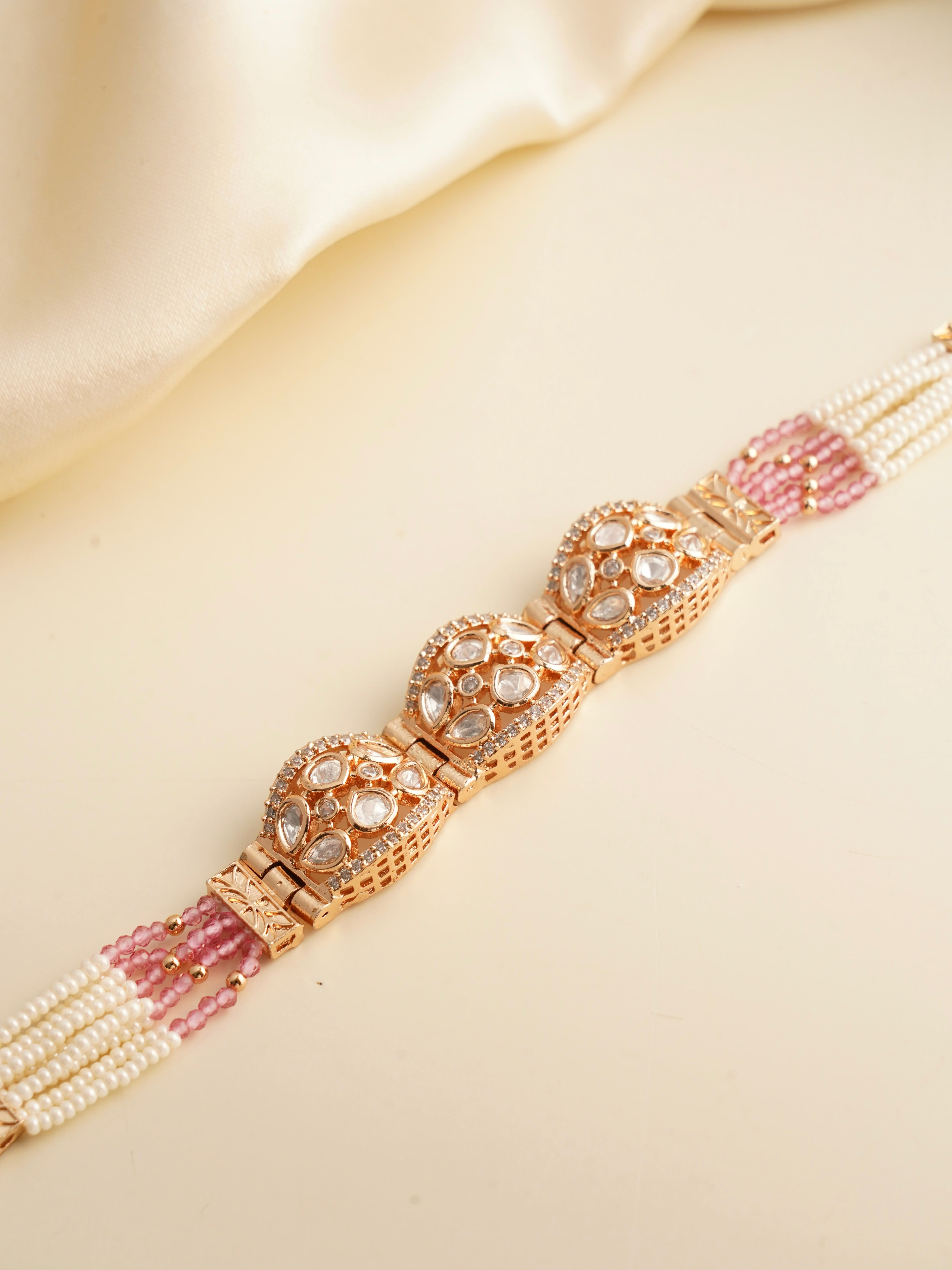Polki dome bracelet with uncut stones, pearl strands and baby pink bead detailing