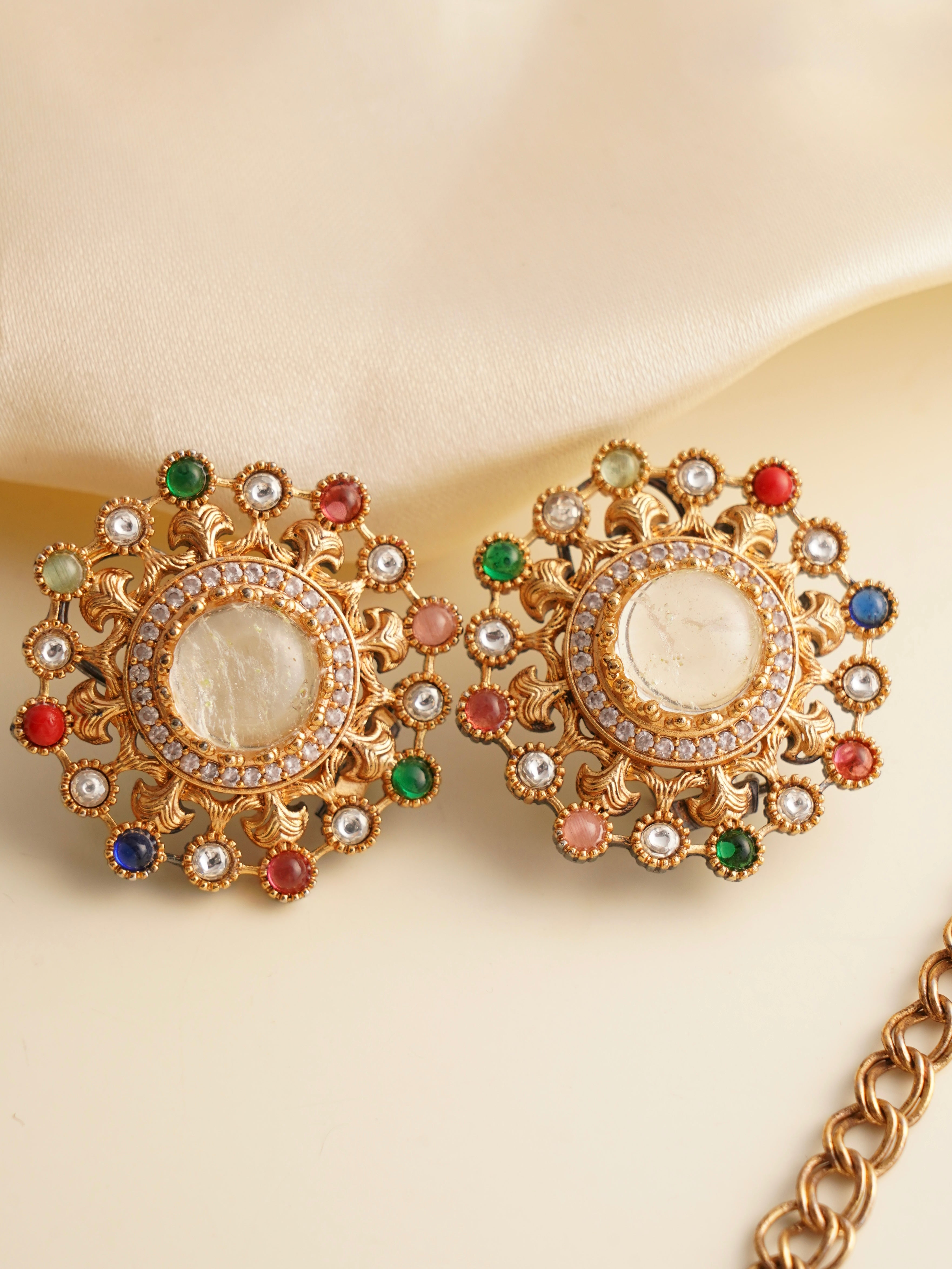 Close-up of navratna pendant showcasing multi-stone setting and gold detailing