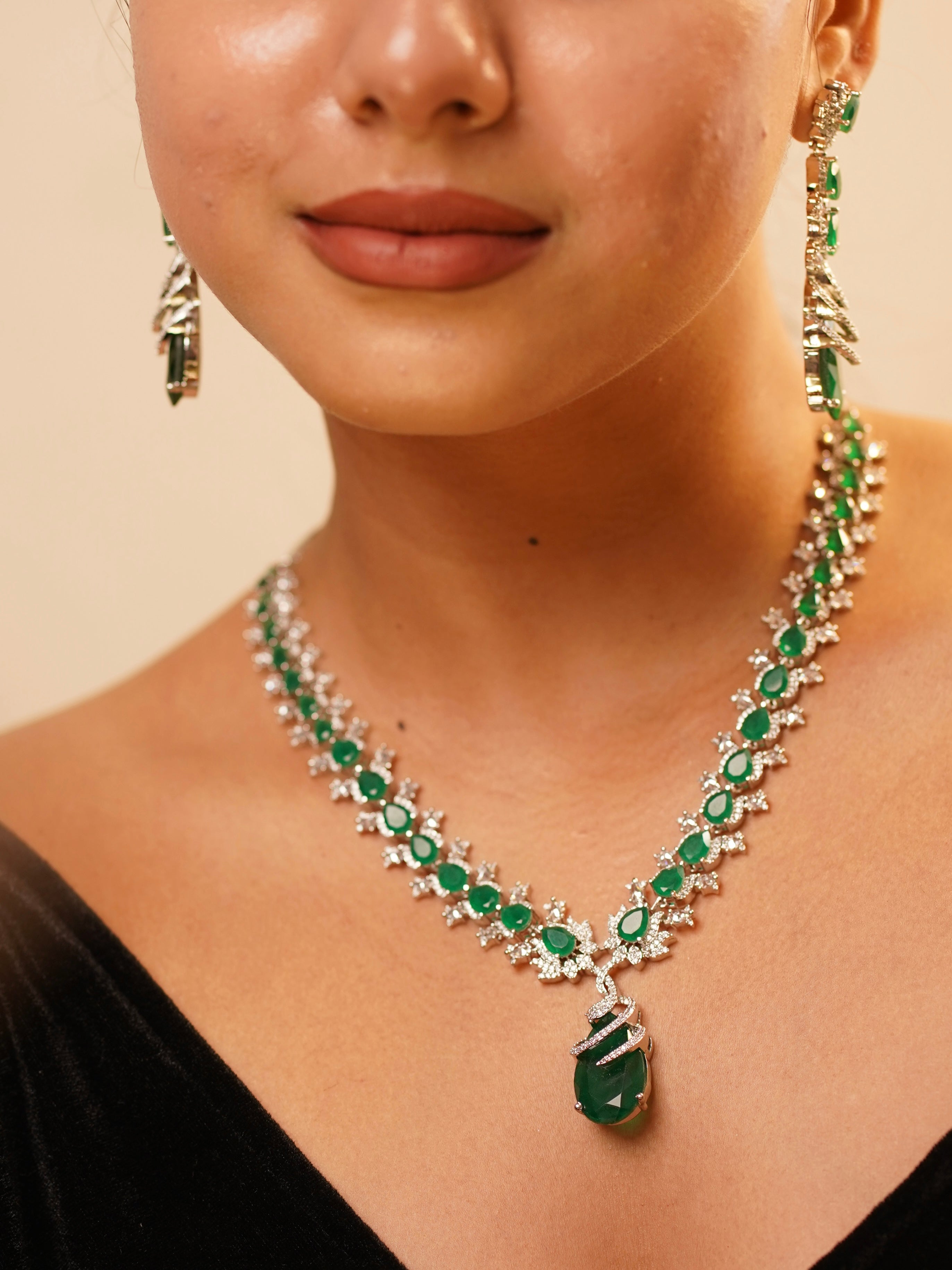 close-up of ruby diamond necklace with shimmering semi-precious stones and rich finish