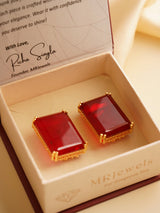 Angled shot showing stone texture and vibrant hues in rectangular earrings