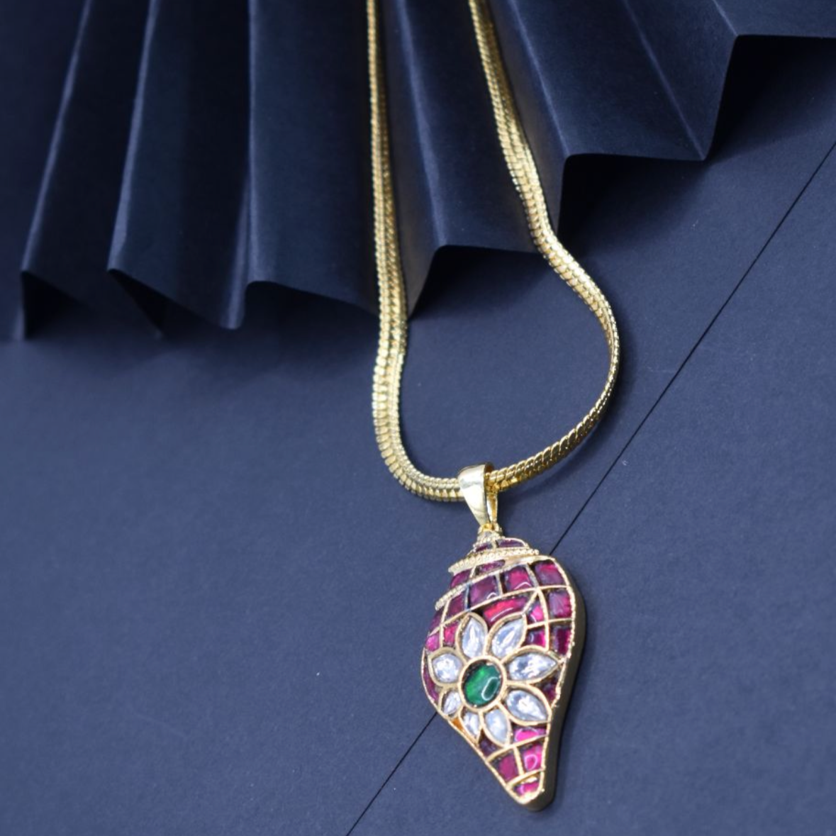 Shank-inspired pachi kundan pendant with real gemstones and handcrafted gold detailing