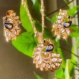 Peacock pendant set with kundan and enamel detailing in front view