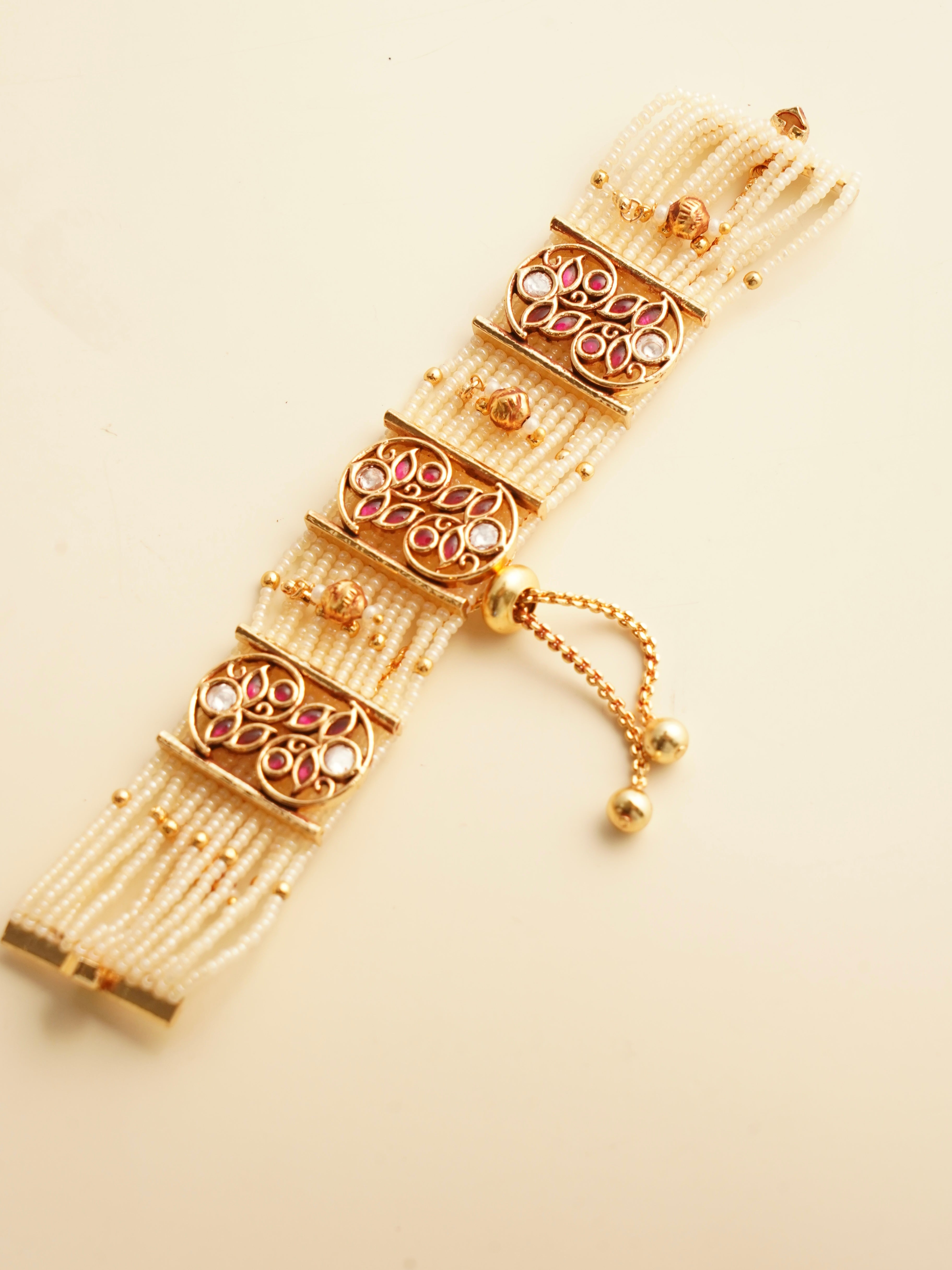 Side view of intricate vilandi jadau bracelet with ornamental craftsmanship