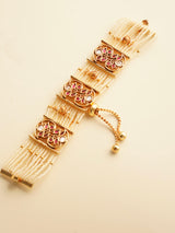 Side view of intricate vilandi jadau bracelet with ornamental craftsmanship