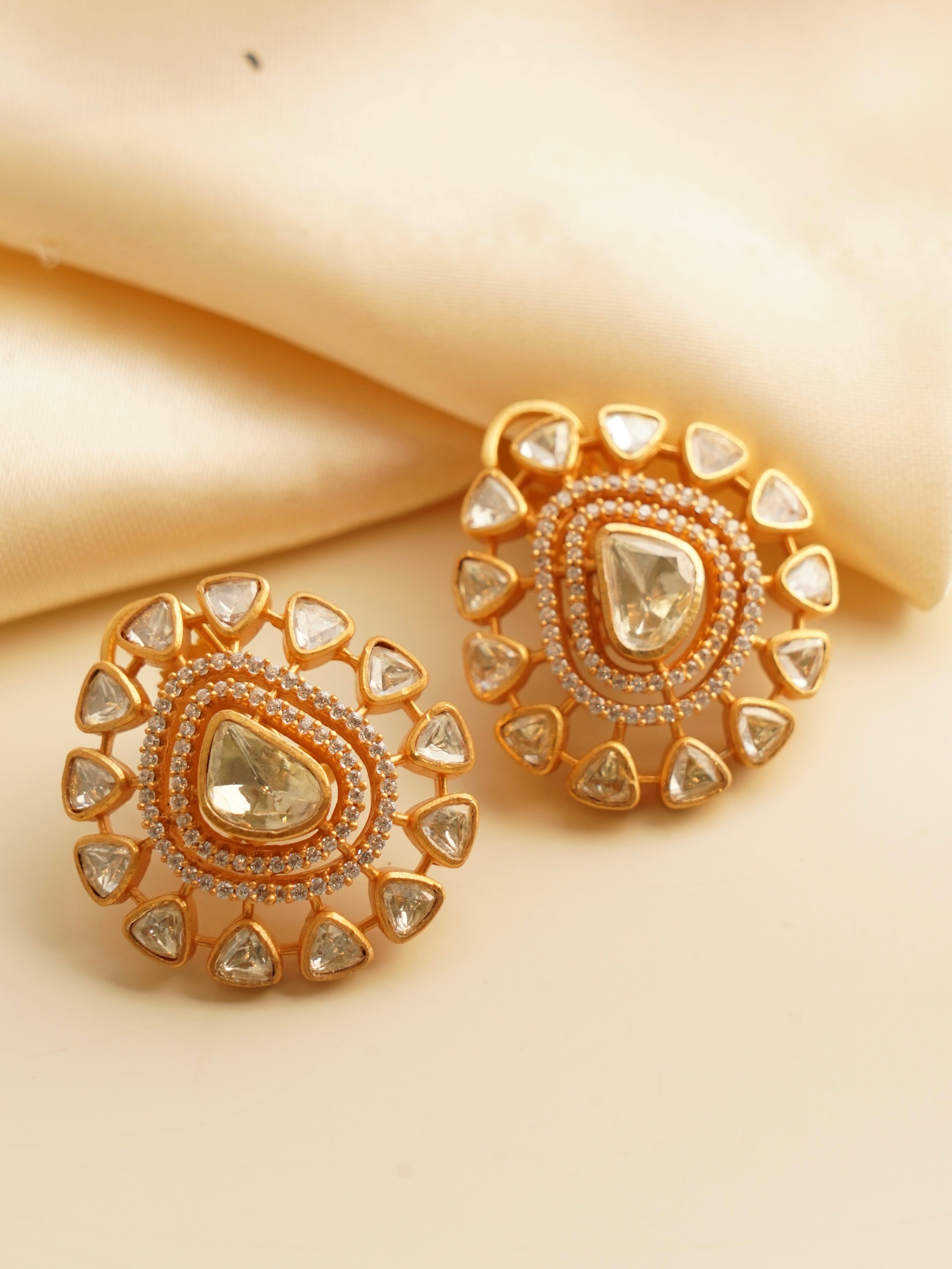 Uncut polki stud earrings with screwback closure in gold tone for versatile styling
