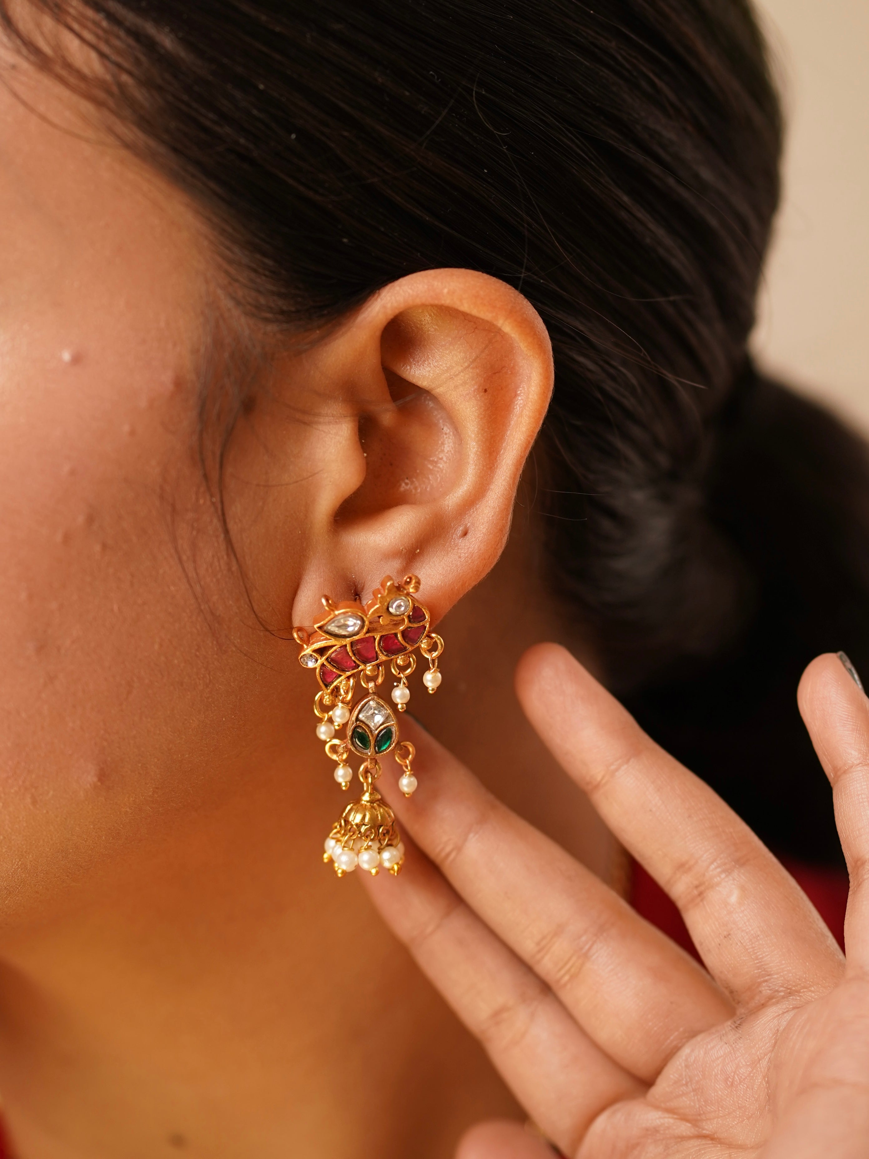 Close-up of pearl-accented jhumka earrings from Noor Leaf Royale Necklace Set