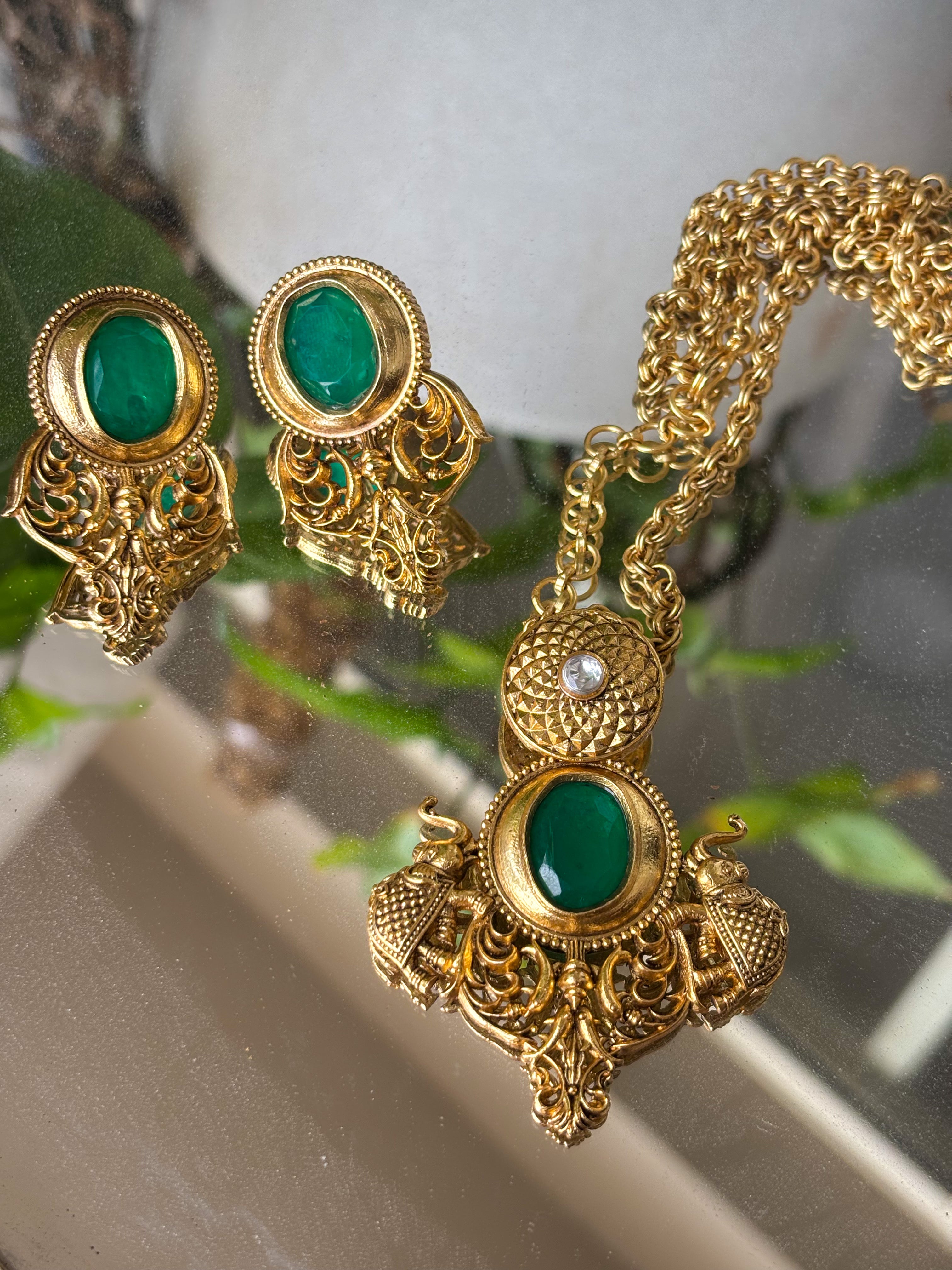 Back detail of necklace set showing clasp design and pushback clip of earrings