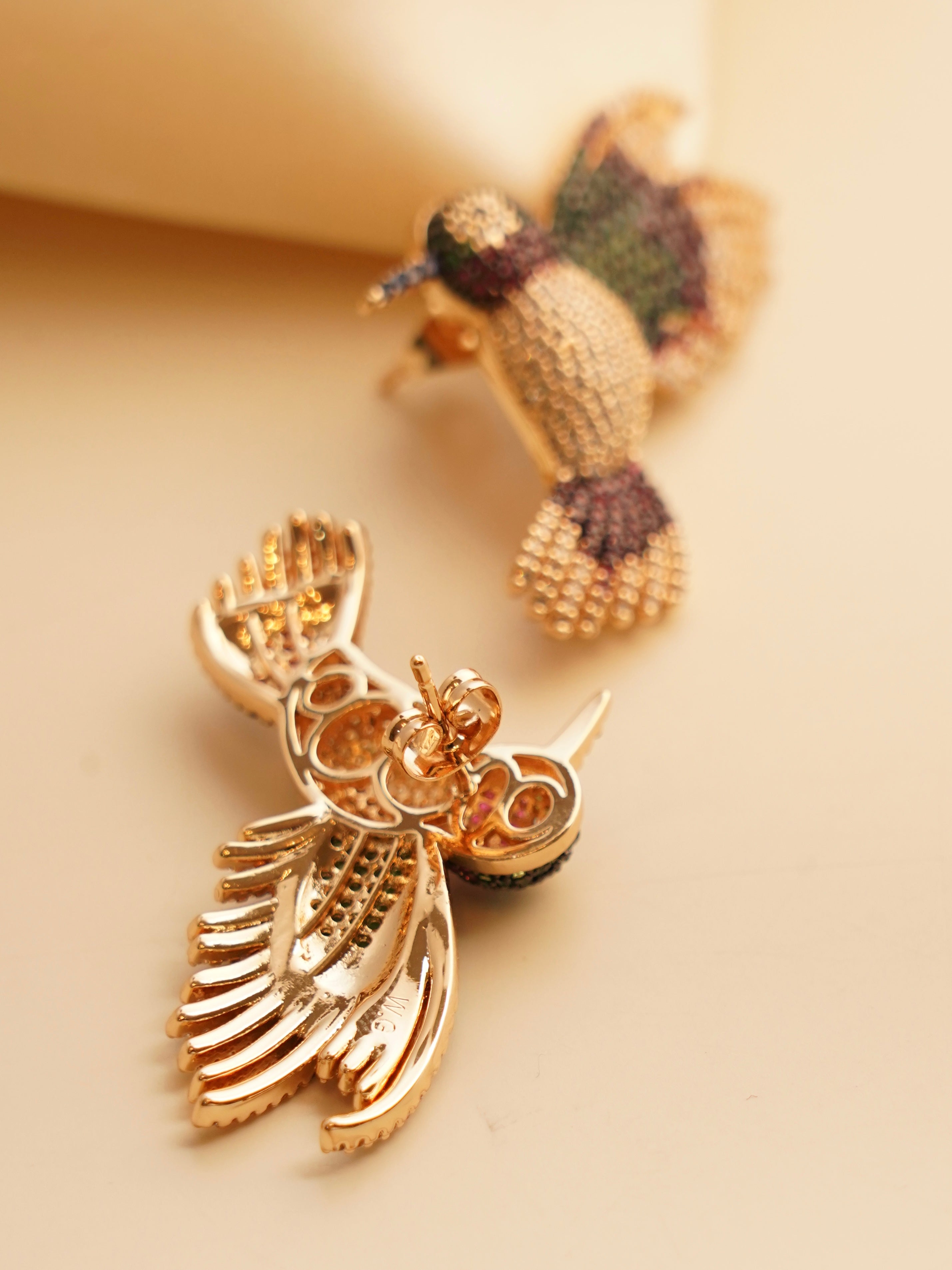 Close-up view of earring back with secure push closure design