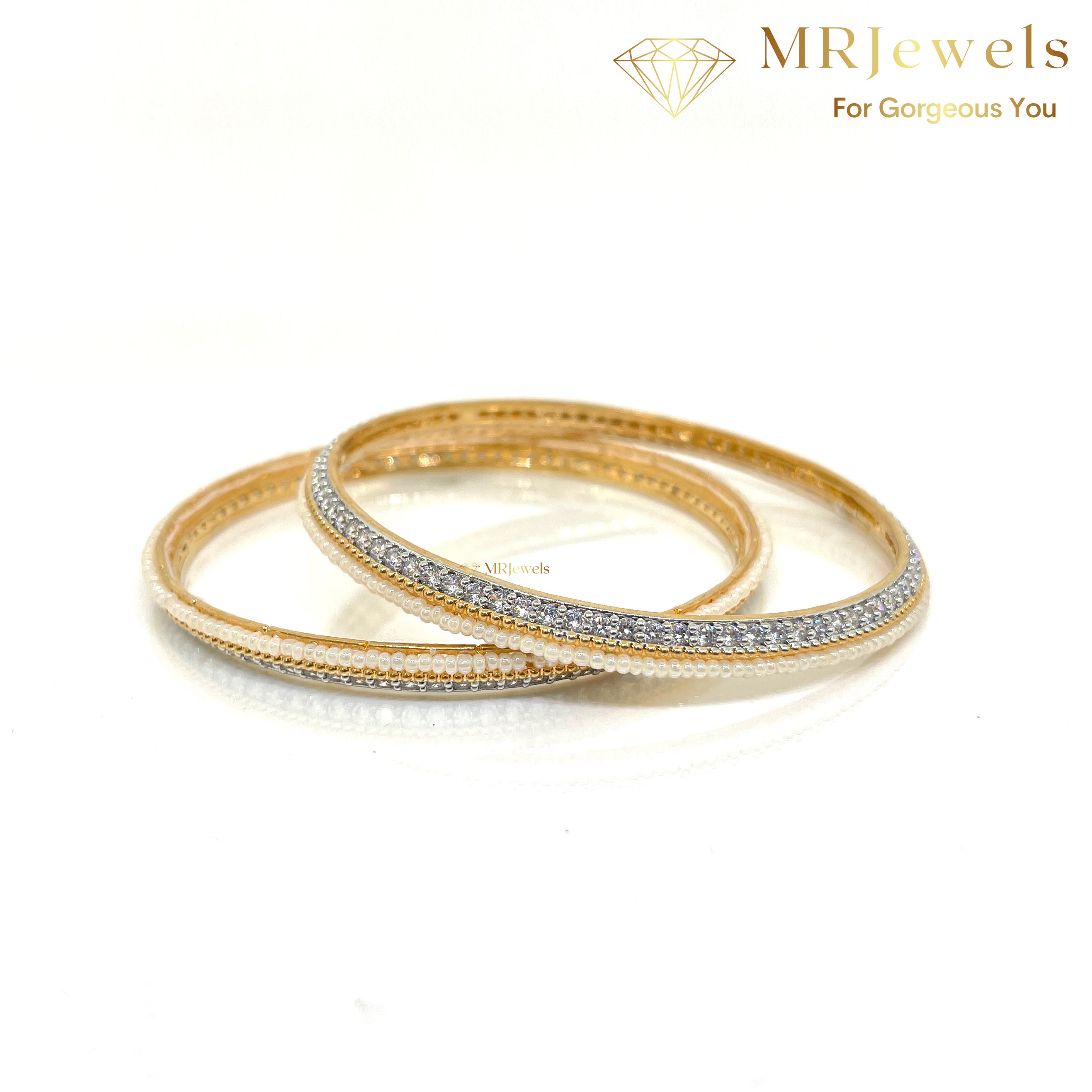 Side view of stone-studded non-openable bangles with polished gold-look surface