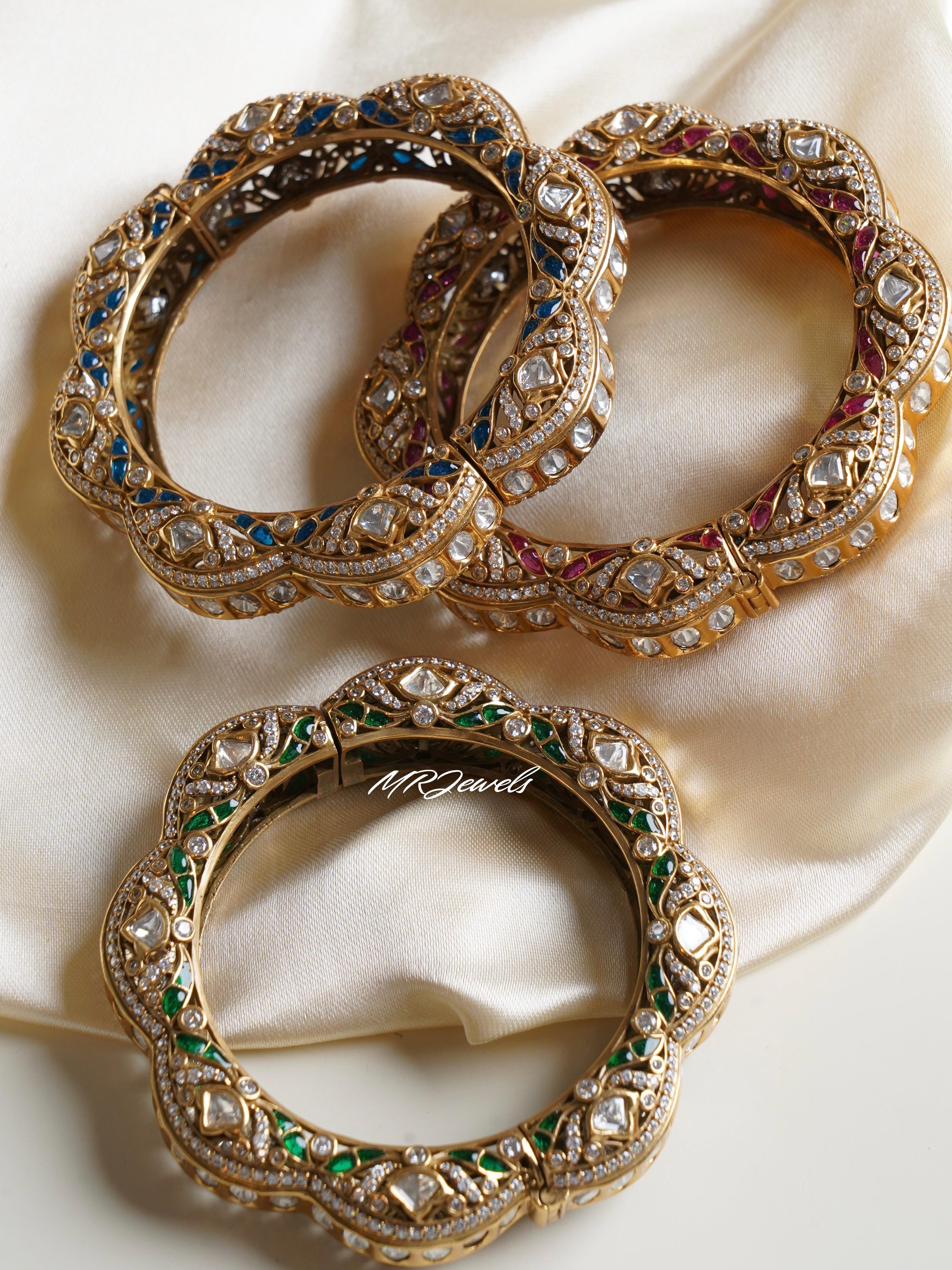 Close-up of polki kadas showcasing intricate kundan setting and gold texture