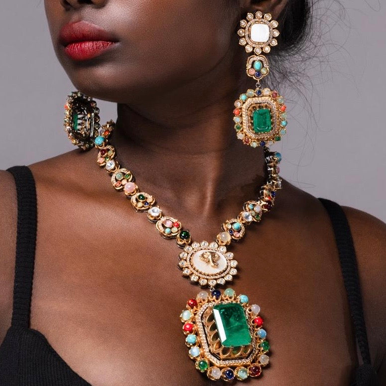 Emerald-inspired statement necklace with enamel and pearl detailing in front view