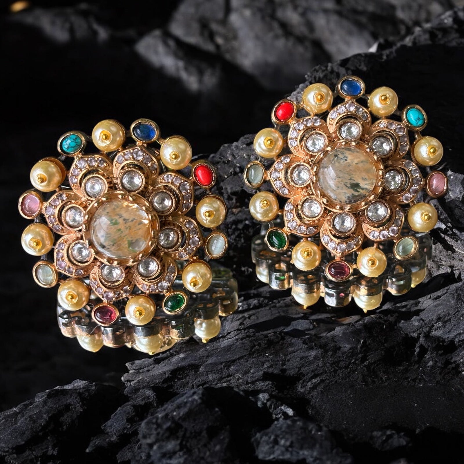 Pearl and kundan earrings with intricate detailing inspired by designer aesthetics, front view