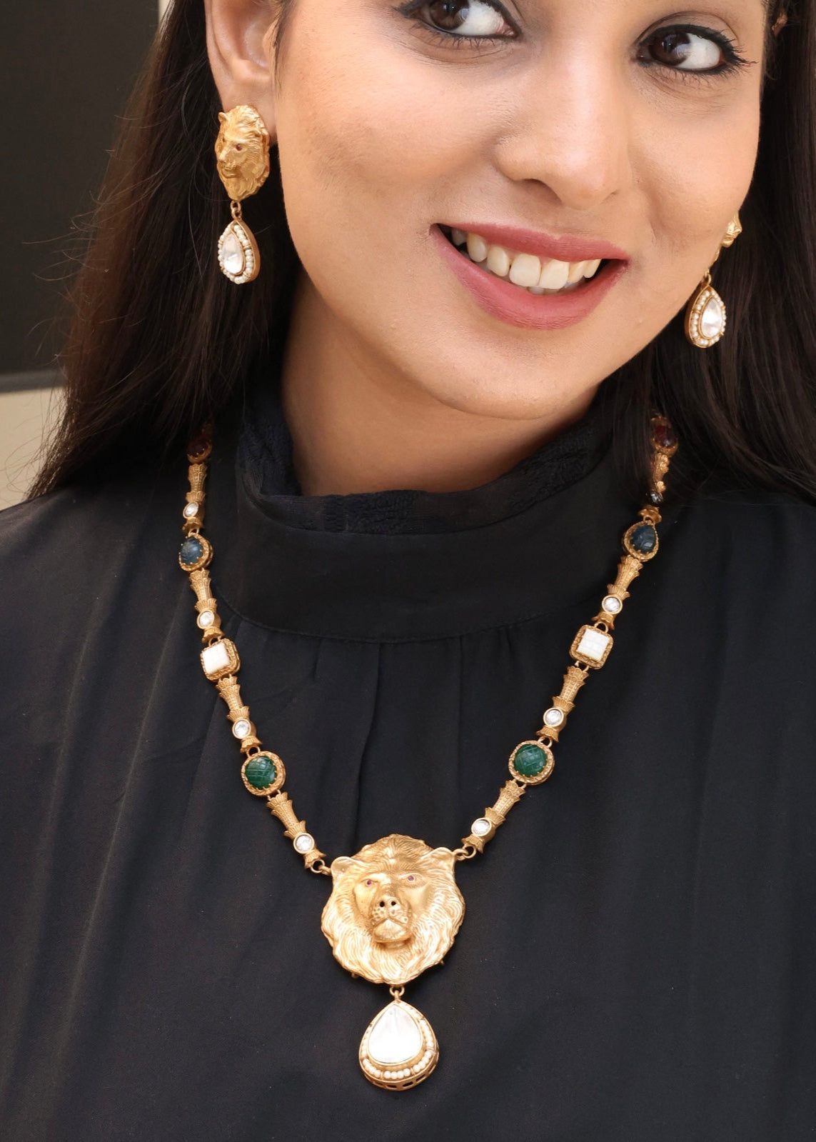 Gold-plated lion motif necklace set with moissanite drop and lion-head earrings