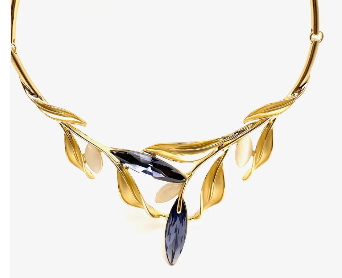 Crystal jewelry set with vine motif necklace and matching earrings in silver finish