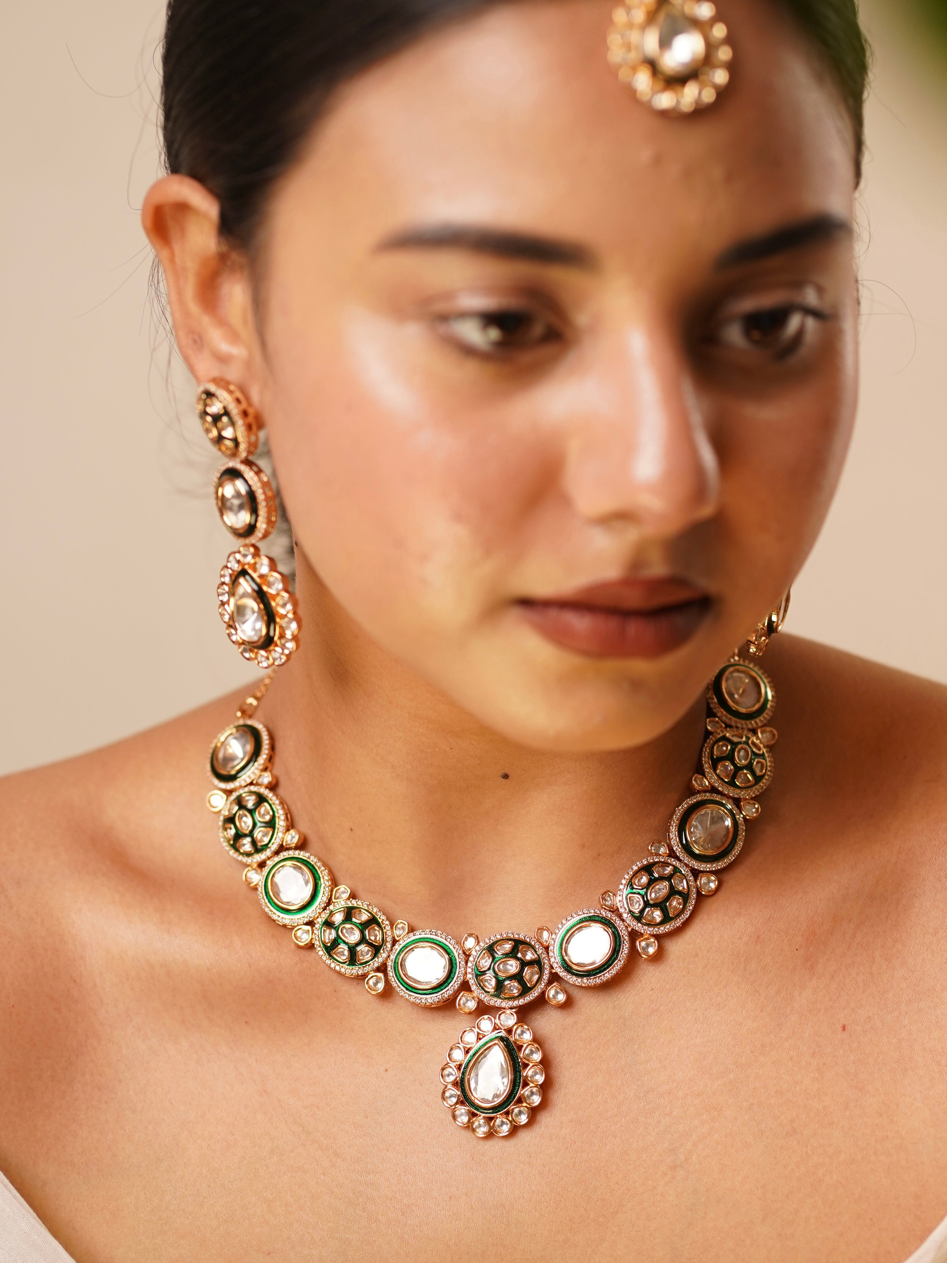 Close-up of polki necklace set highlighting detailed stonework and luxurious finish
