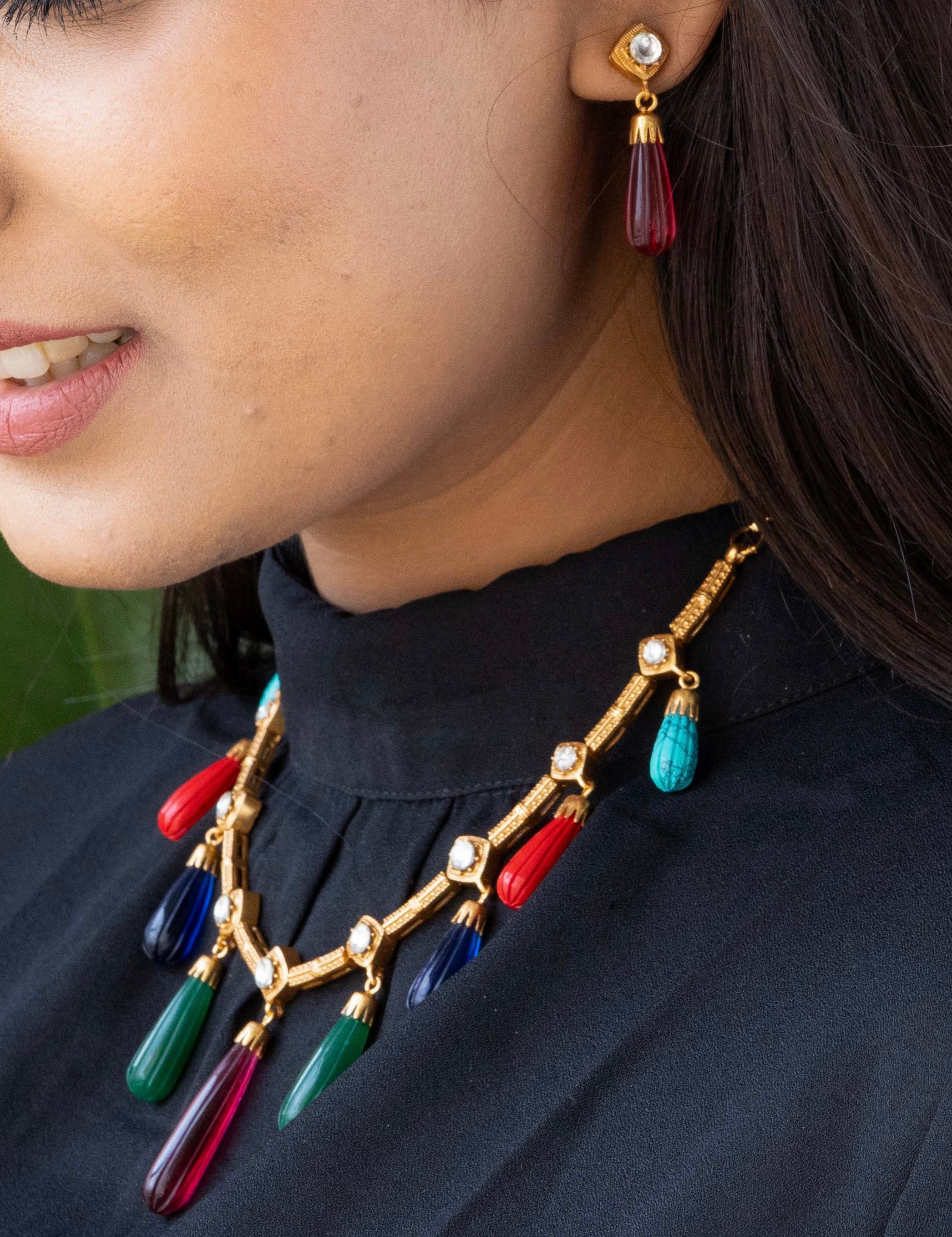 Zoomed-in view of pendant area with embedded stones and polished metal surface