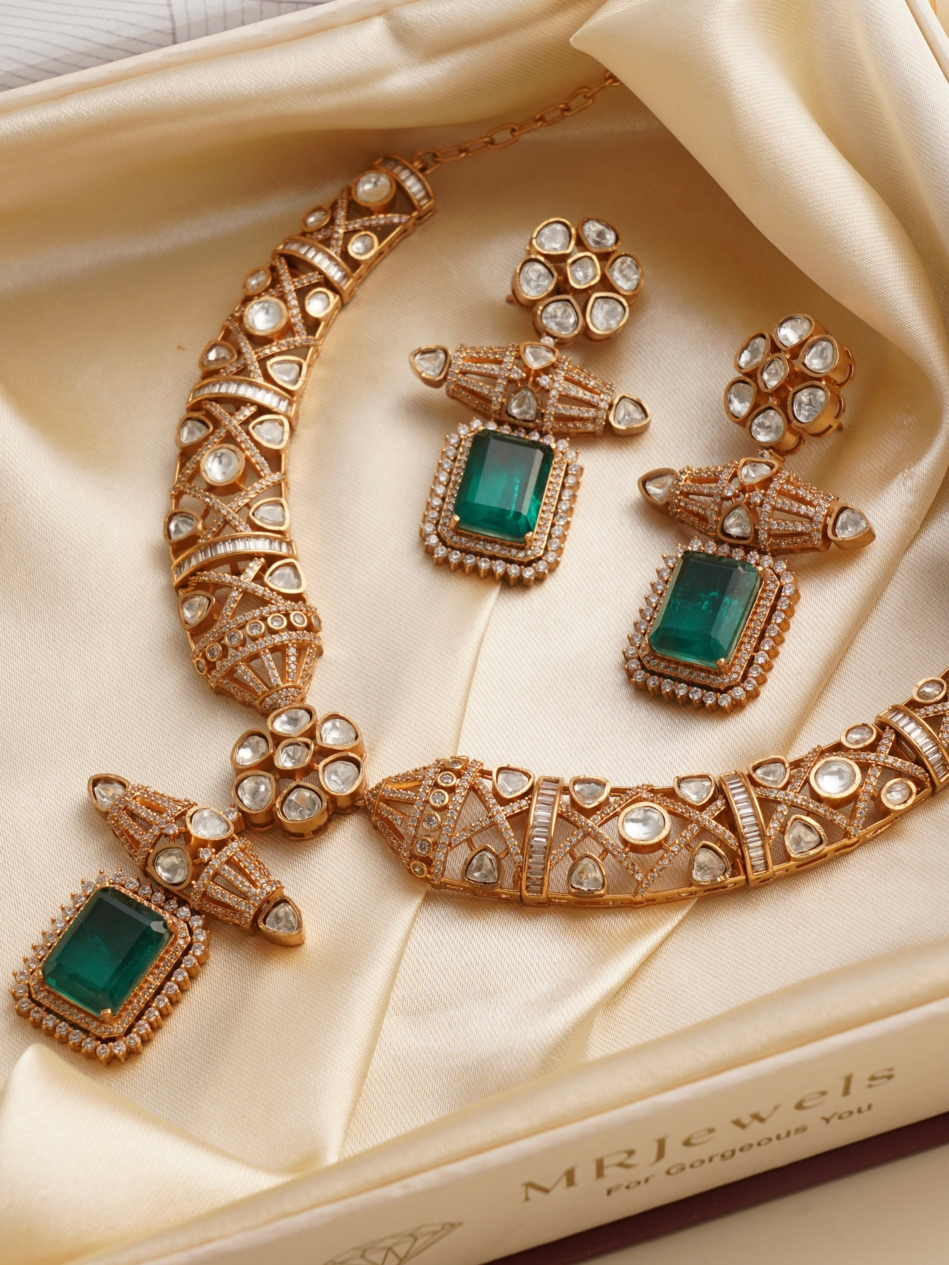 Close-up of emerald-cut polki centre stone in choker necklace