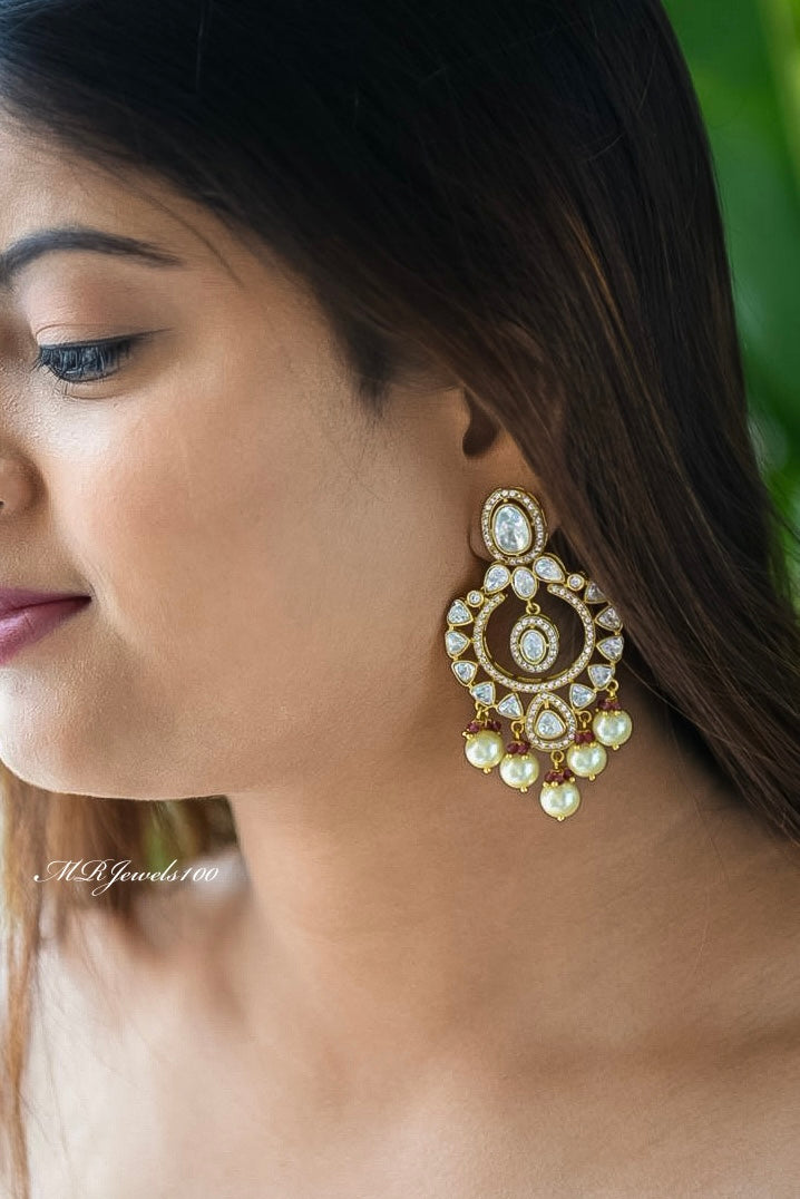 Long uncut polki earrings with pearl strands and gold-tone finish