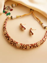 Side view of meenakari hasli with intricate enamel work and curved structure