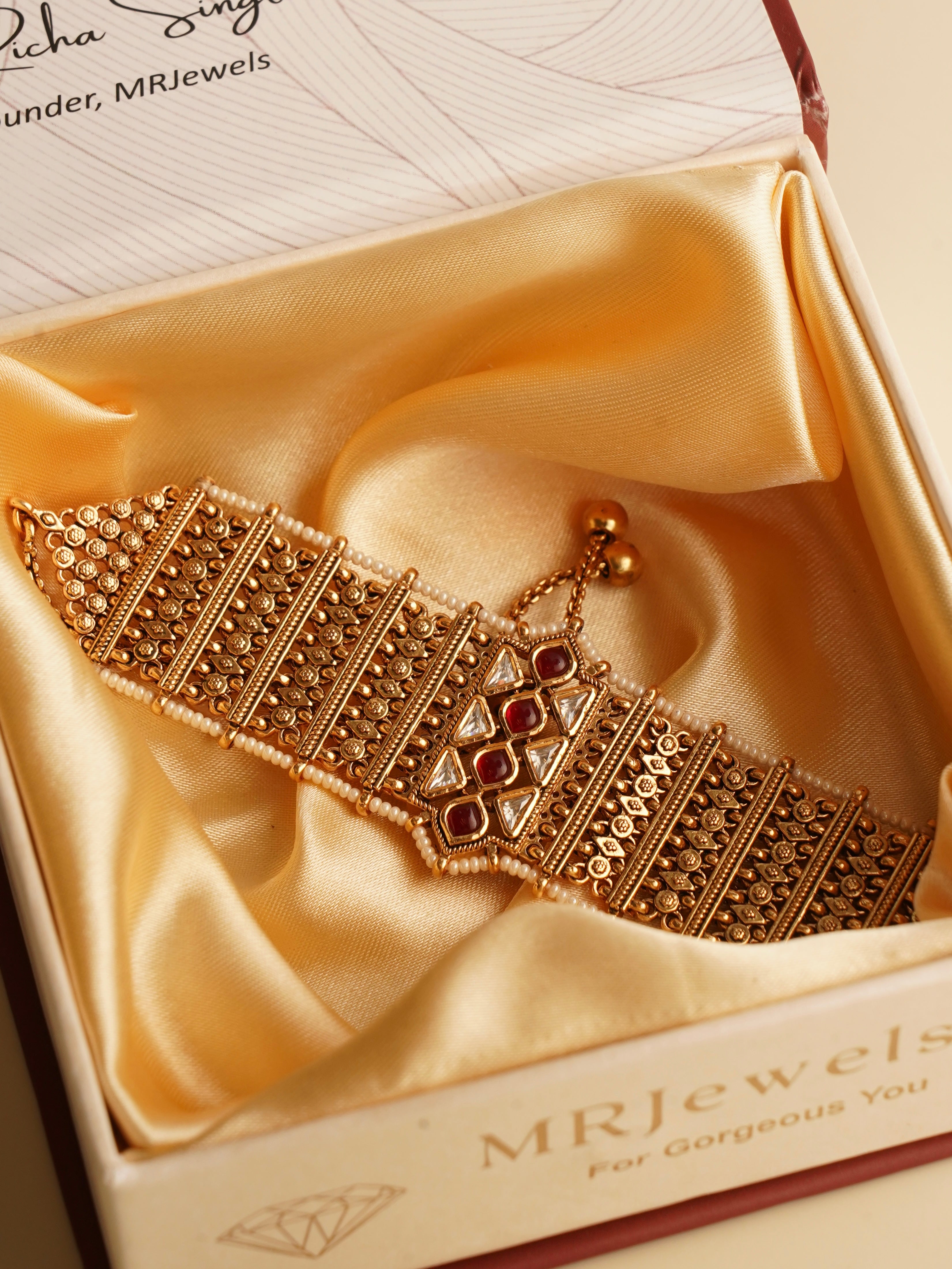 side view of vilandi-style bracelet in high-shine micron gold finish