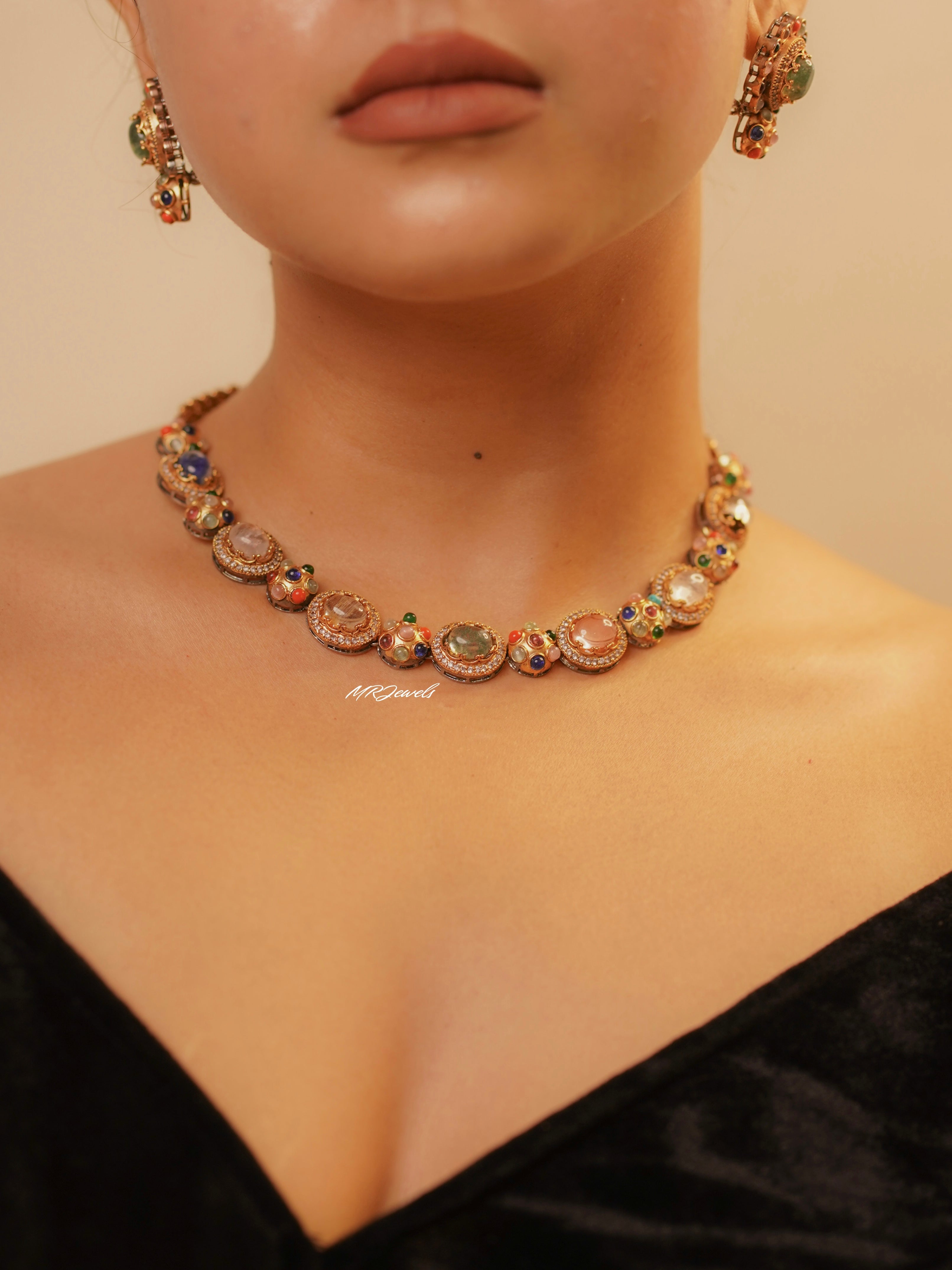 Close-up of vibrant navrattan stone arrangement on traditional necklace set