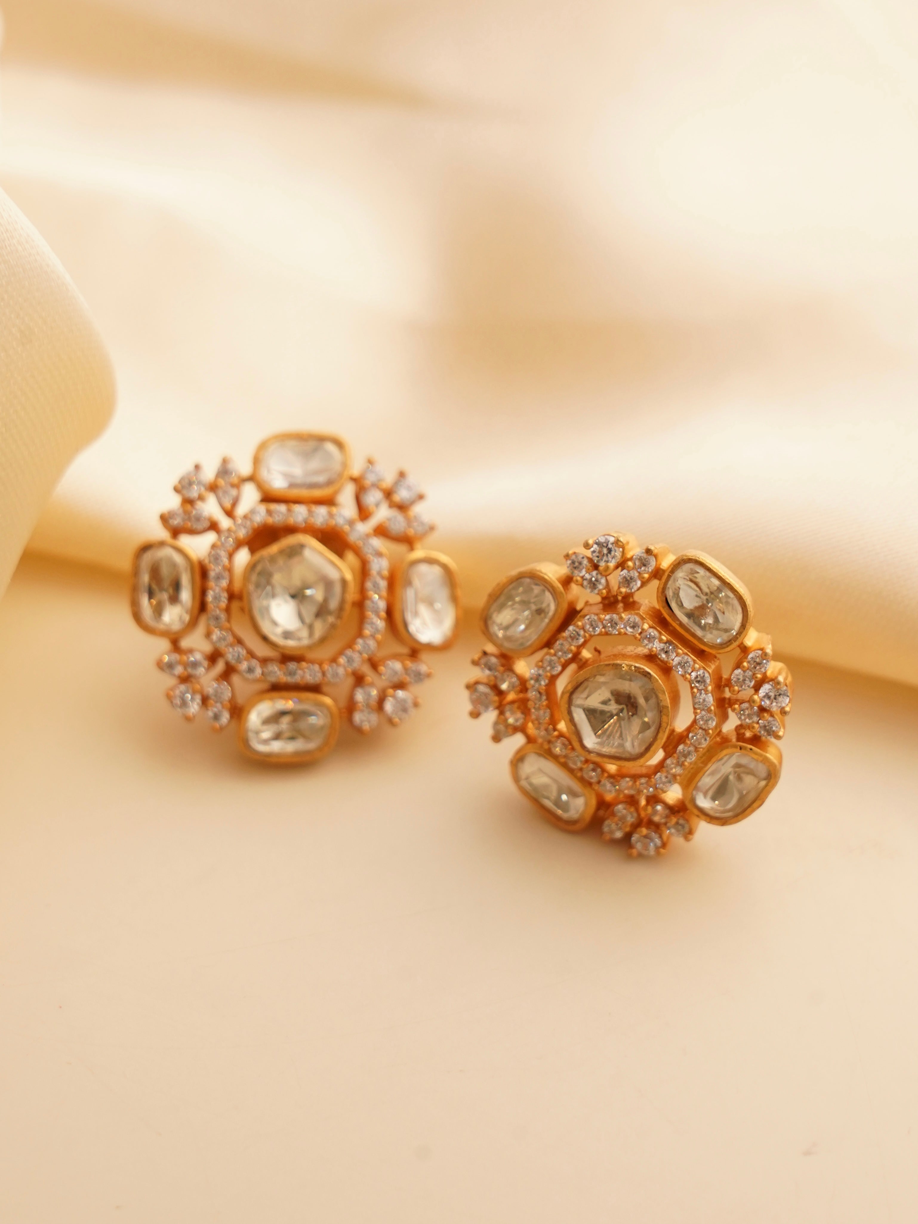 Side view of moissanite screw-back studs showing secure closure and clear solitaire stones