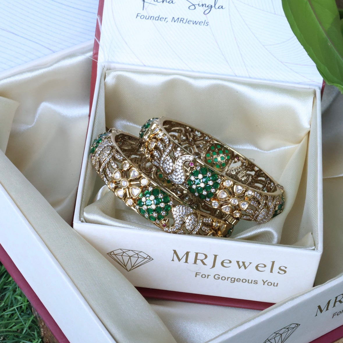 Top view of openable bangles pair highlighting stone symmetry and classic design