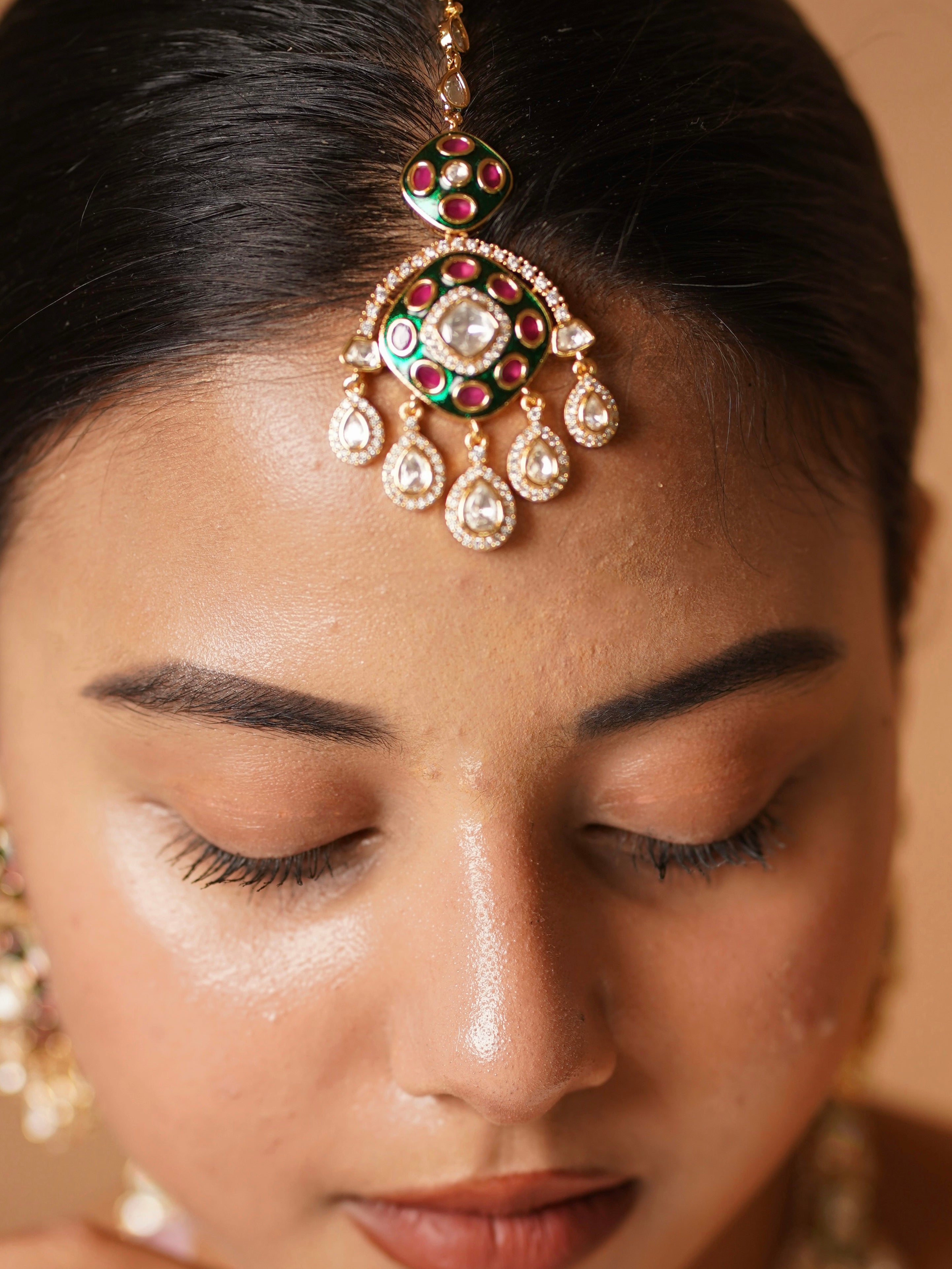 Angled close-up of meenakari necklace highlighting kundan and enamel artistry