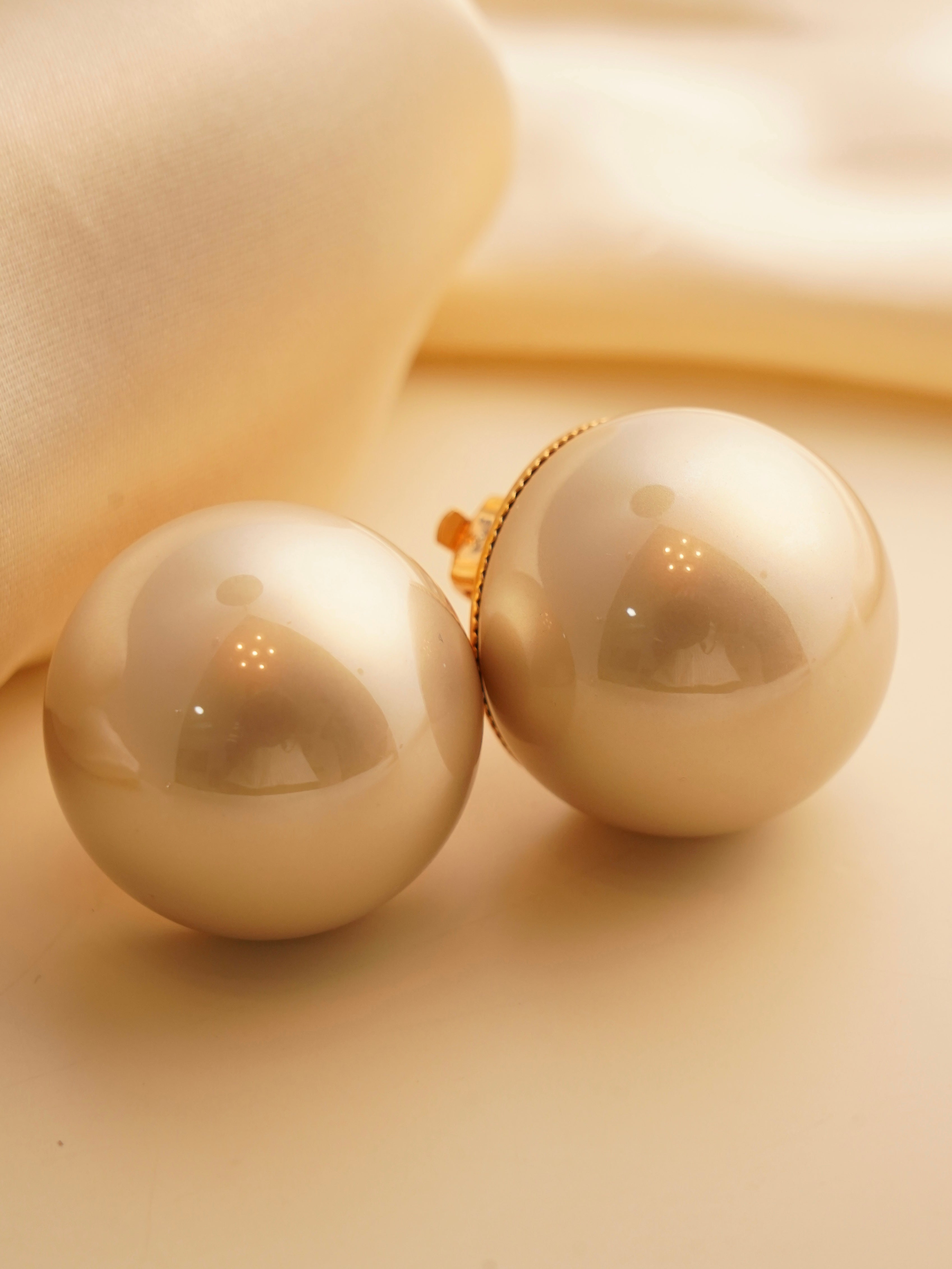 Oversized freshwater pearl studs with 30mm diameter in classic front view