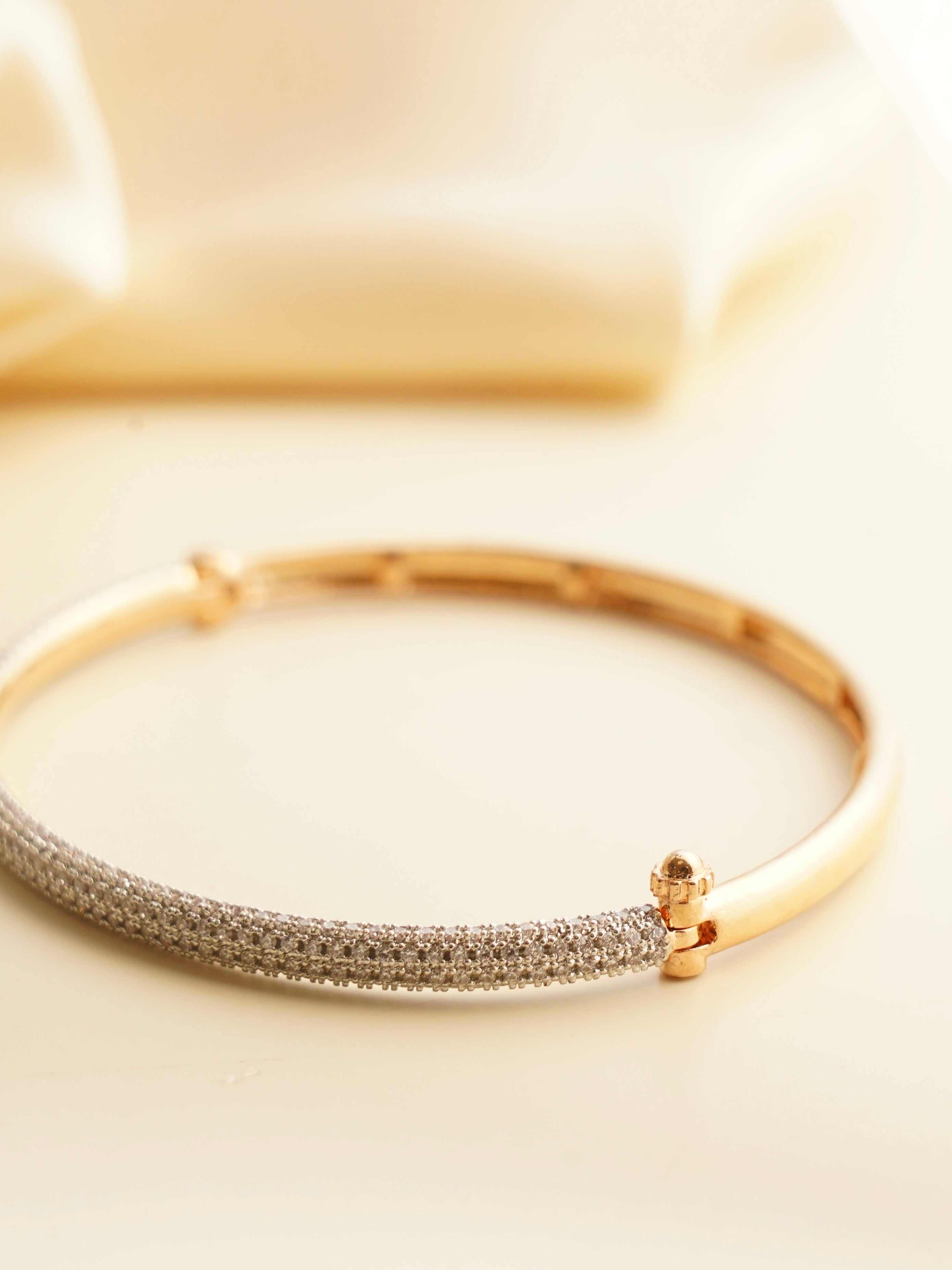 Close-up of daily wear gold-plated bracelet showing silver alloy base and clasp