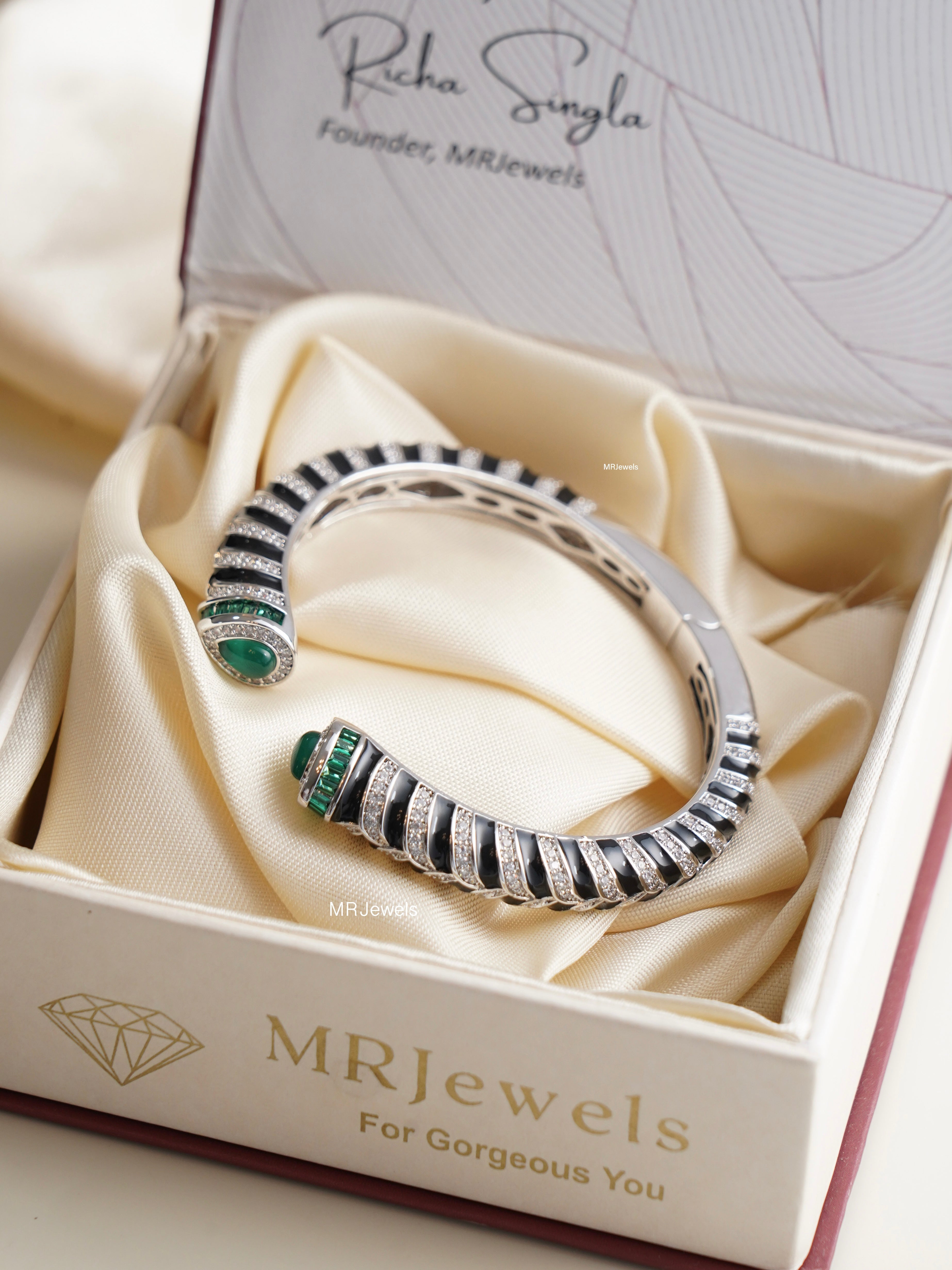 onyx dome curve kada bracelets stacked on wrist showcasing sleek enamel stripes and cz shine