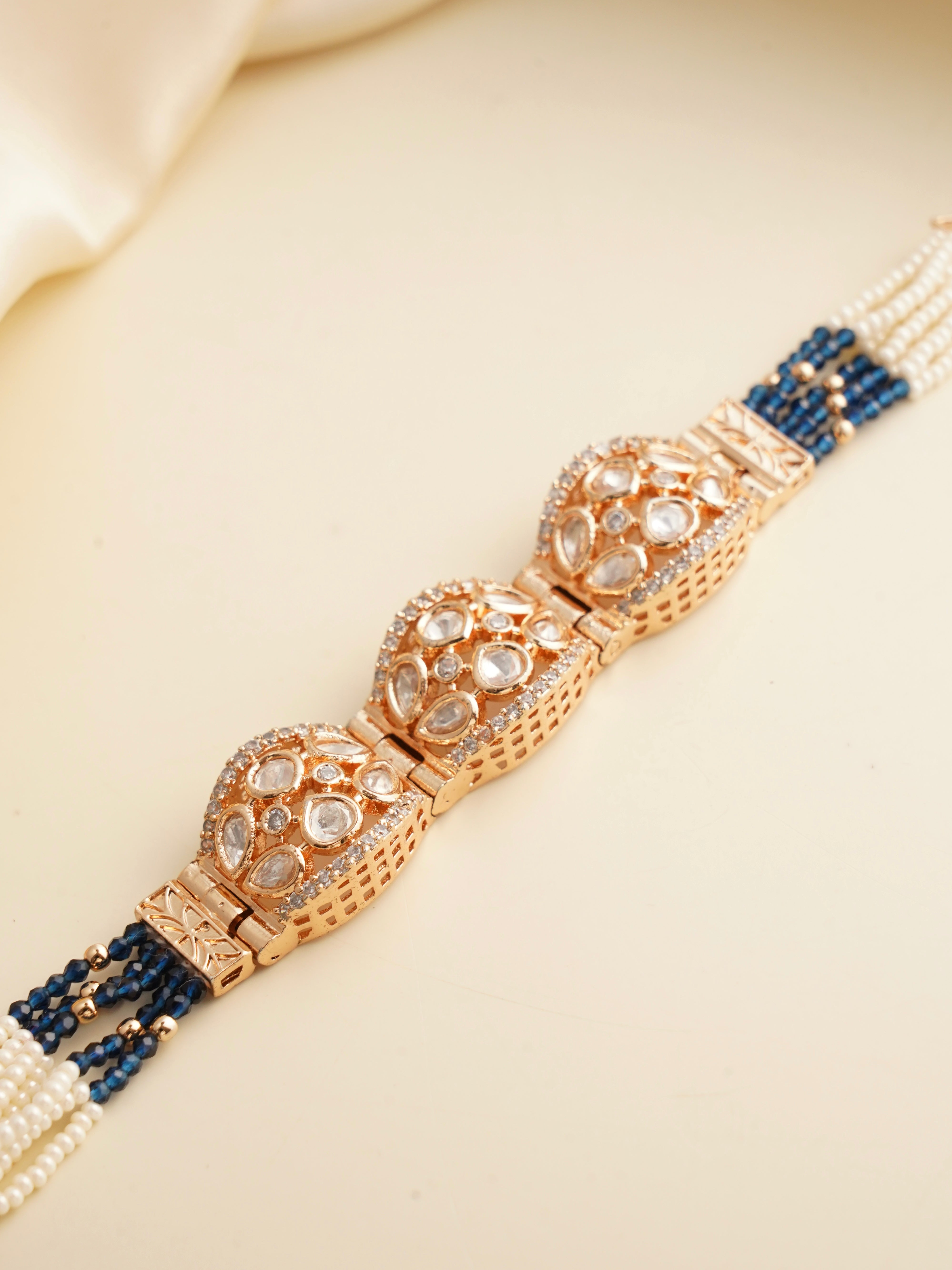 Polki dome bracelet with uncut stones, pearl rows and navy blue bead strands