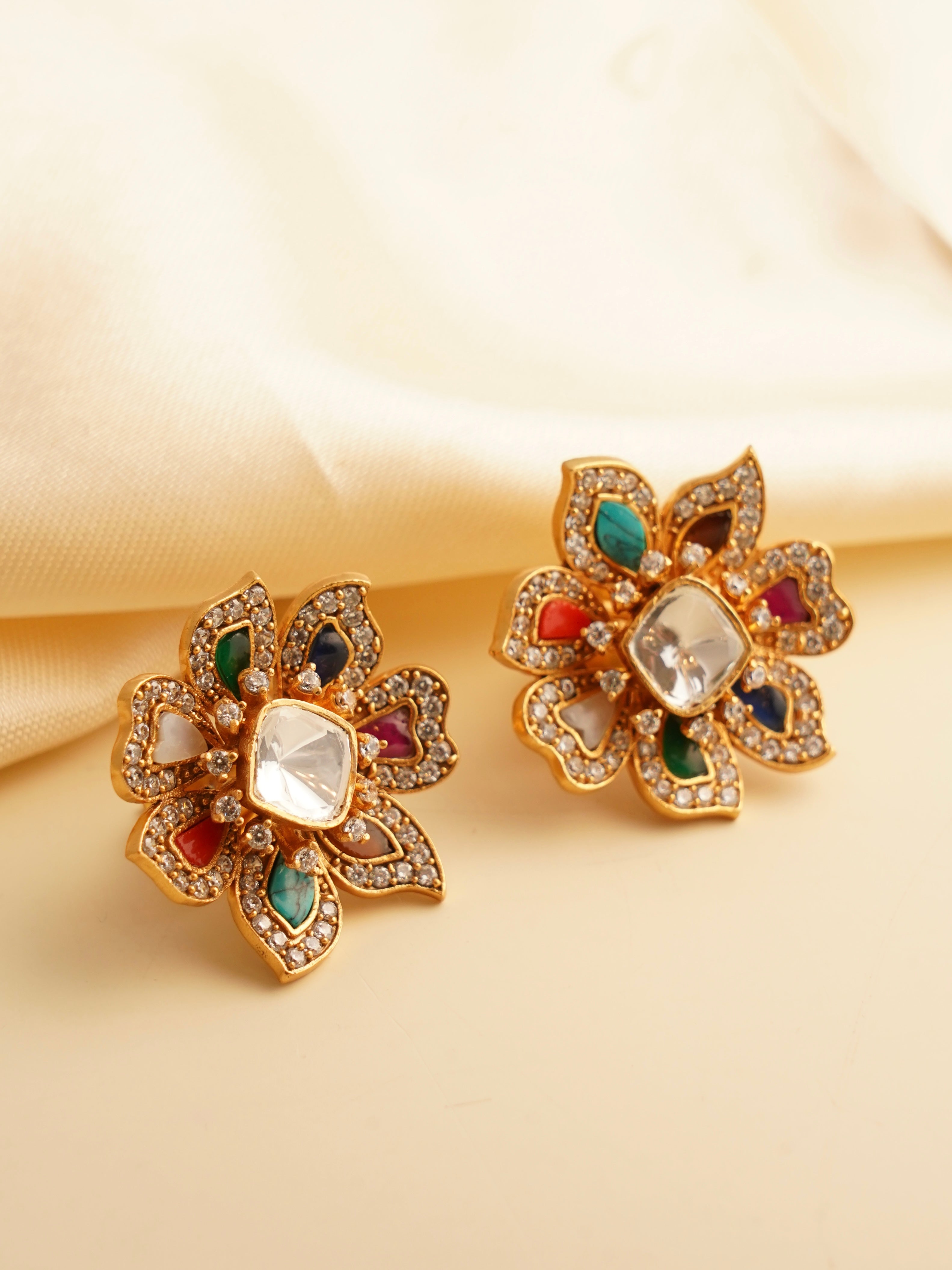 Mother of pearl and moissanite polki stud earrings in gold plated brass