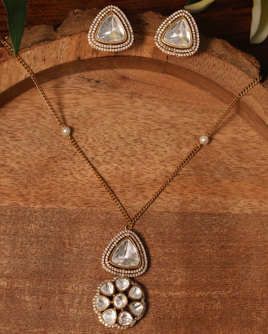 Teardrop crystal necklace set with gold-plated chain and matching crystal earrings