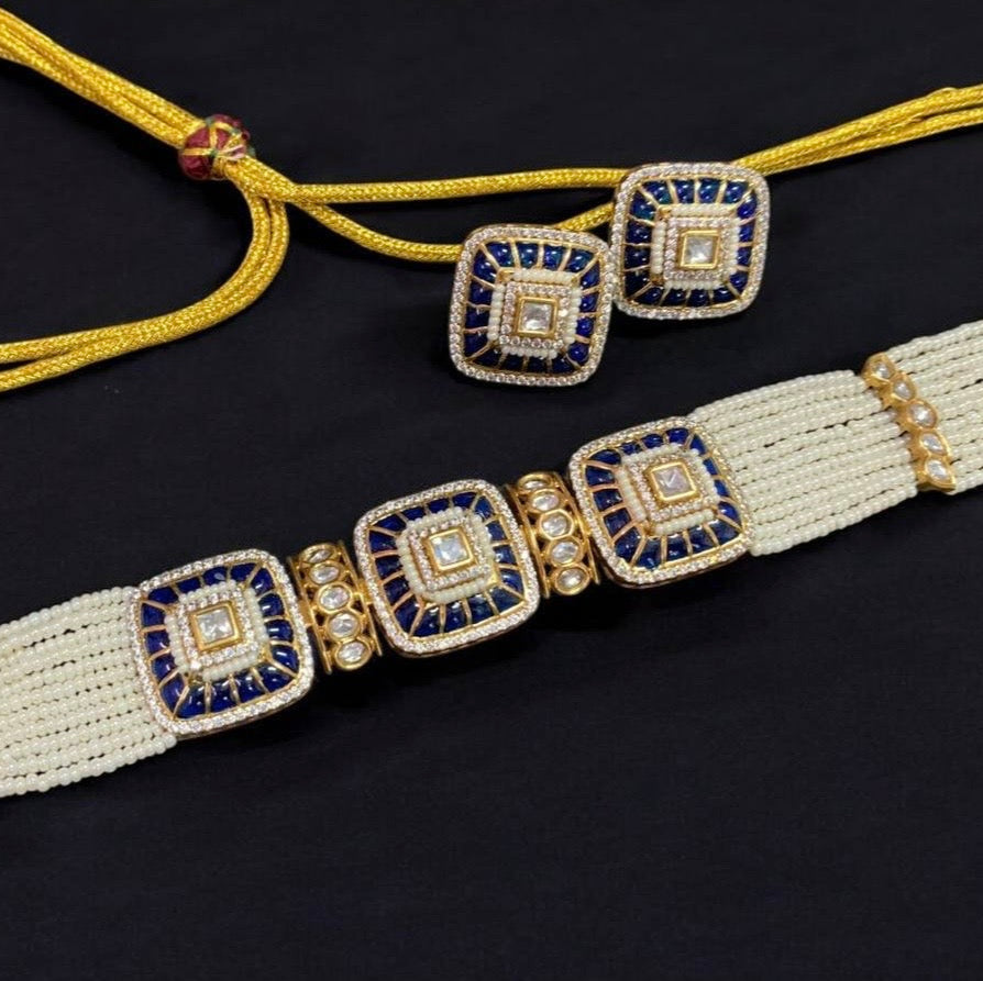 Close-up of choker with pearls, polkis, and thick enamel meena khaka work